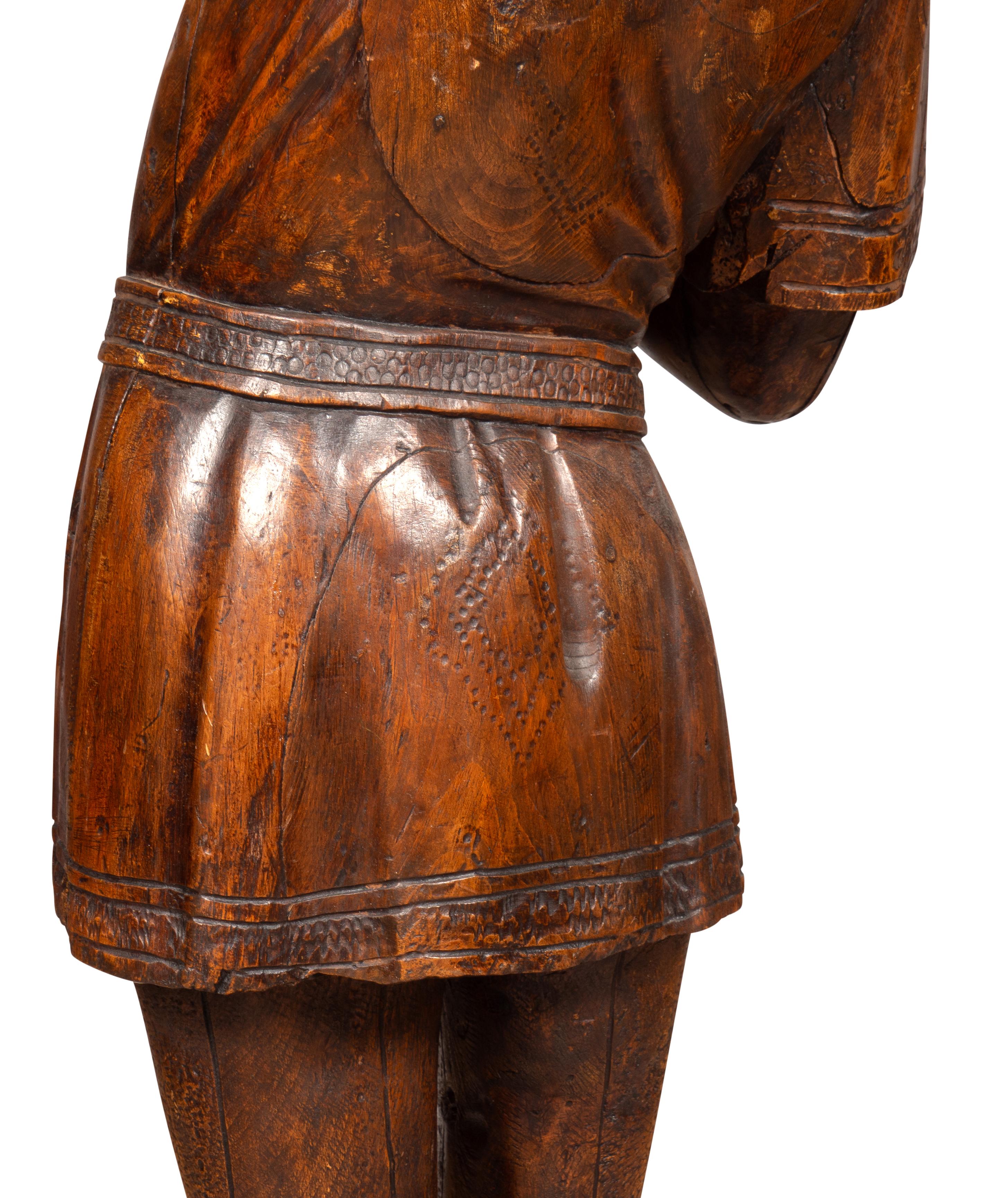 Italian Carved Walnut Torchere Of A Standing Boy Holding A Torch For Sale 2