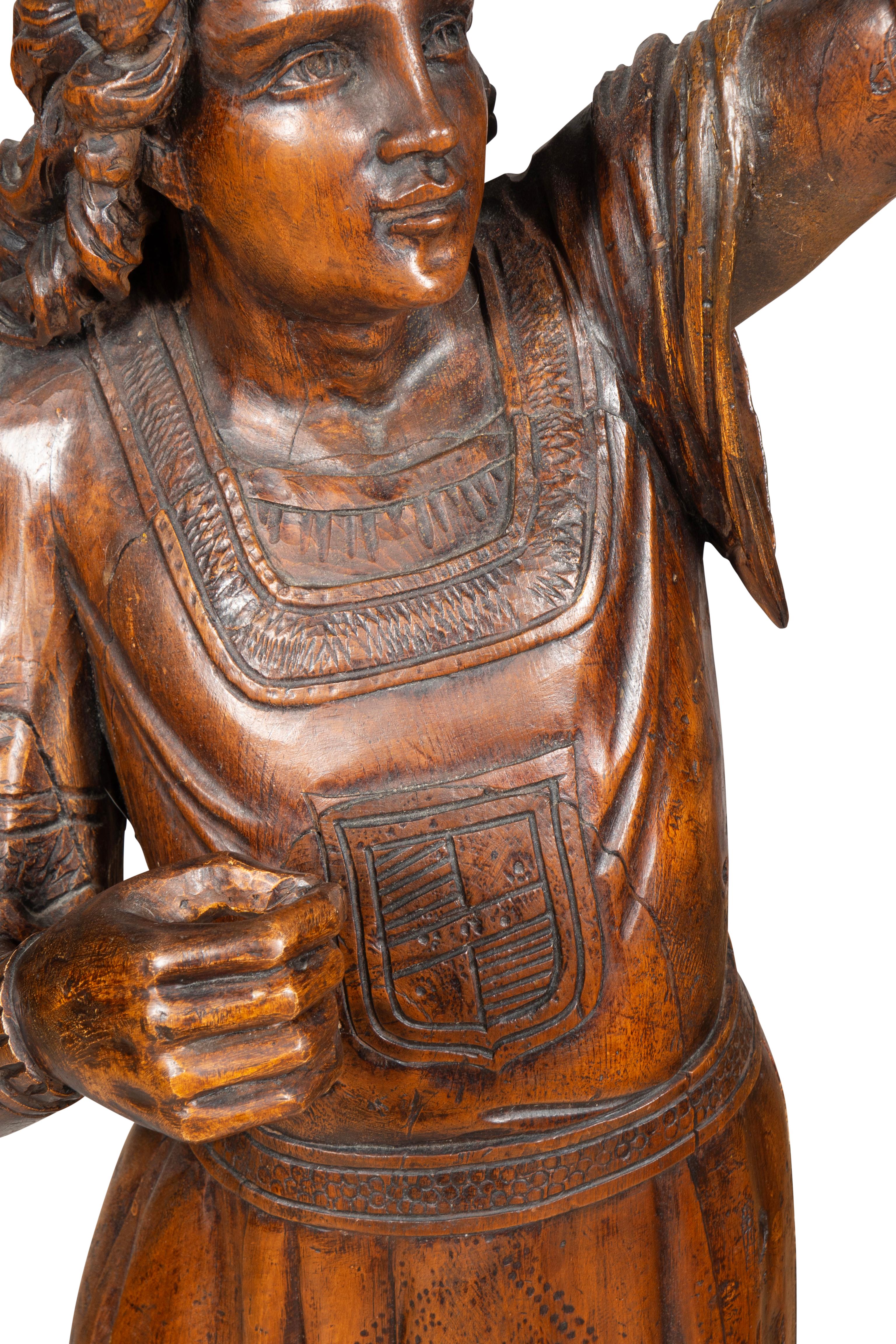 Italian Carved Walnut Torchere Of A Standing Boy Holding A Torch For Sale 5