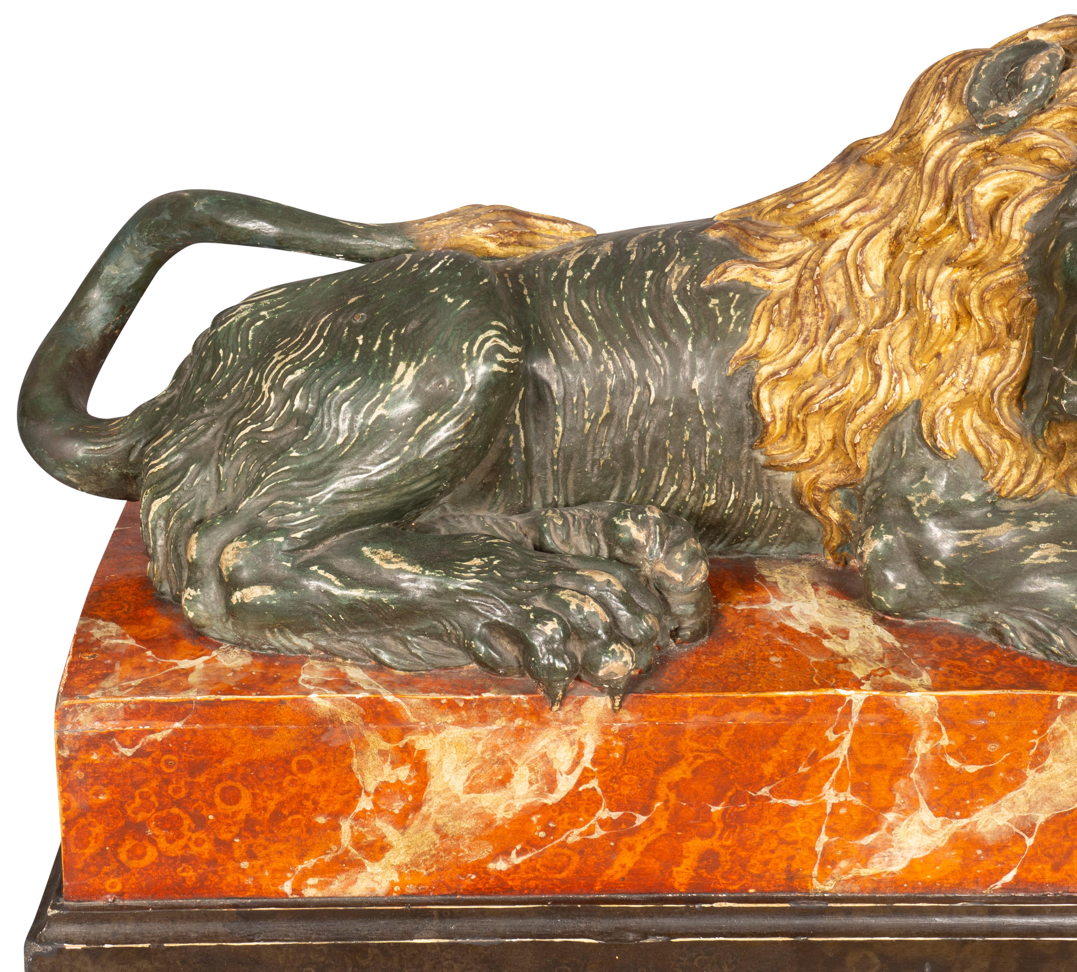 European Italian Carved Wood and Painted Reclining Lion For Sale