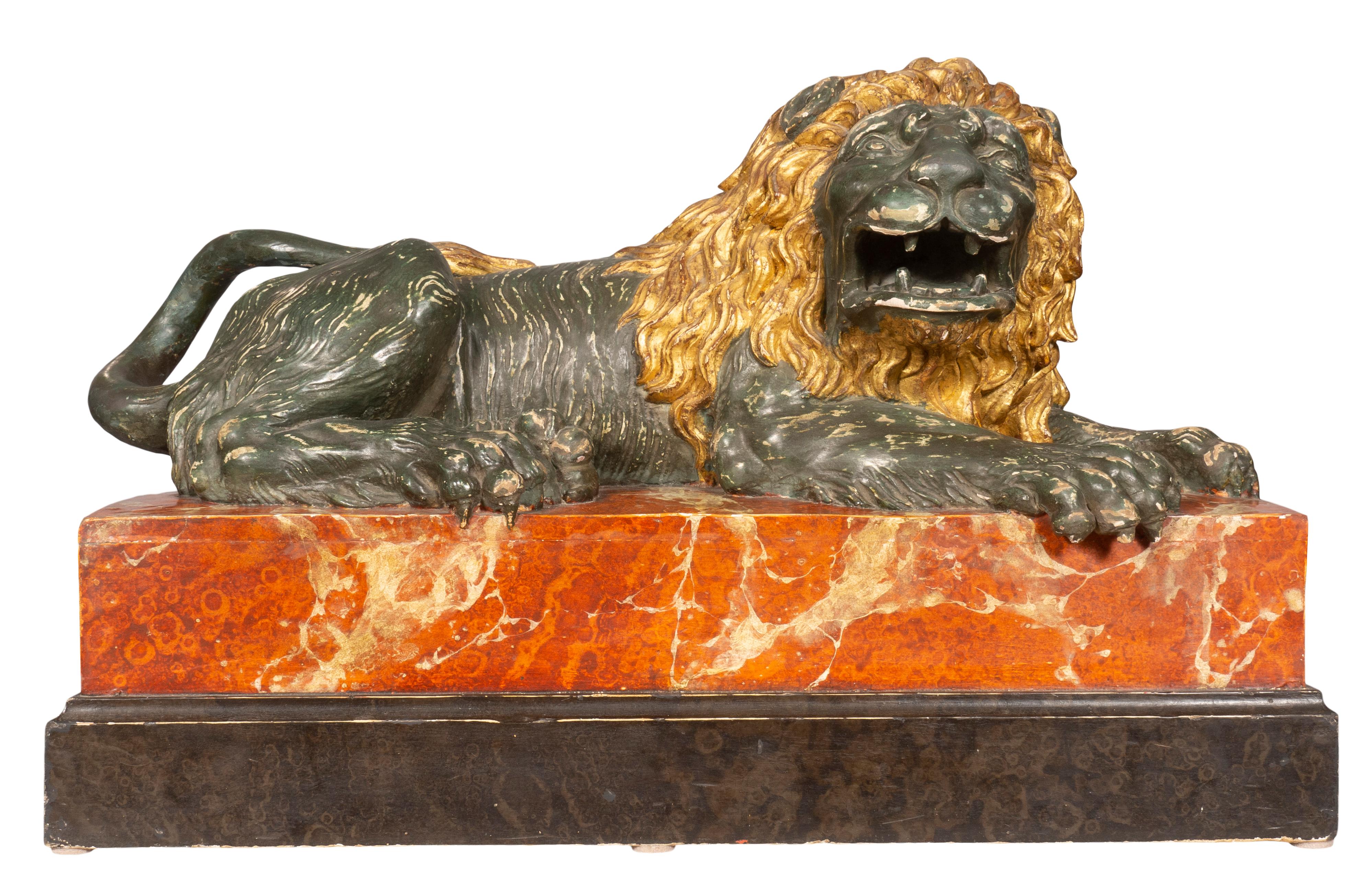 Hand-Carved Italian Carved Wood and Painted Reclining Lion For Sale