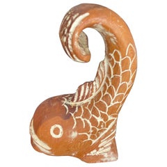 Sculpture italienne en bois sculpté représentant un poisson-soie