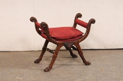Italienischer geschnitzter Curule-Hocker aus Holz mit Pfotenfüßen, frühes 20. Jahrhundert.