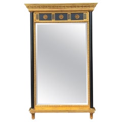 Italian Carvers’ Guild  Style Carved Giltwood  & Ebony Trumeau Mirror