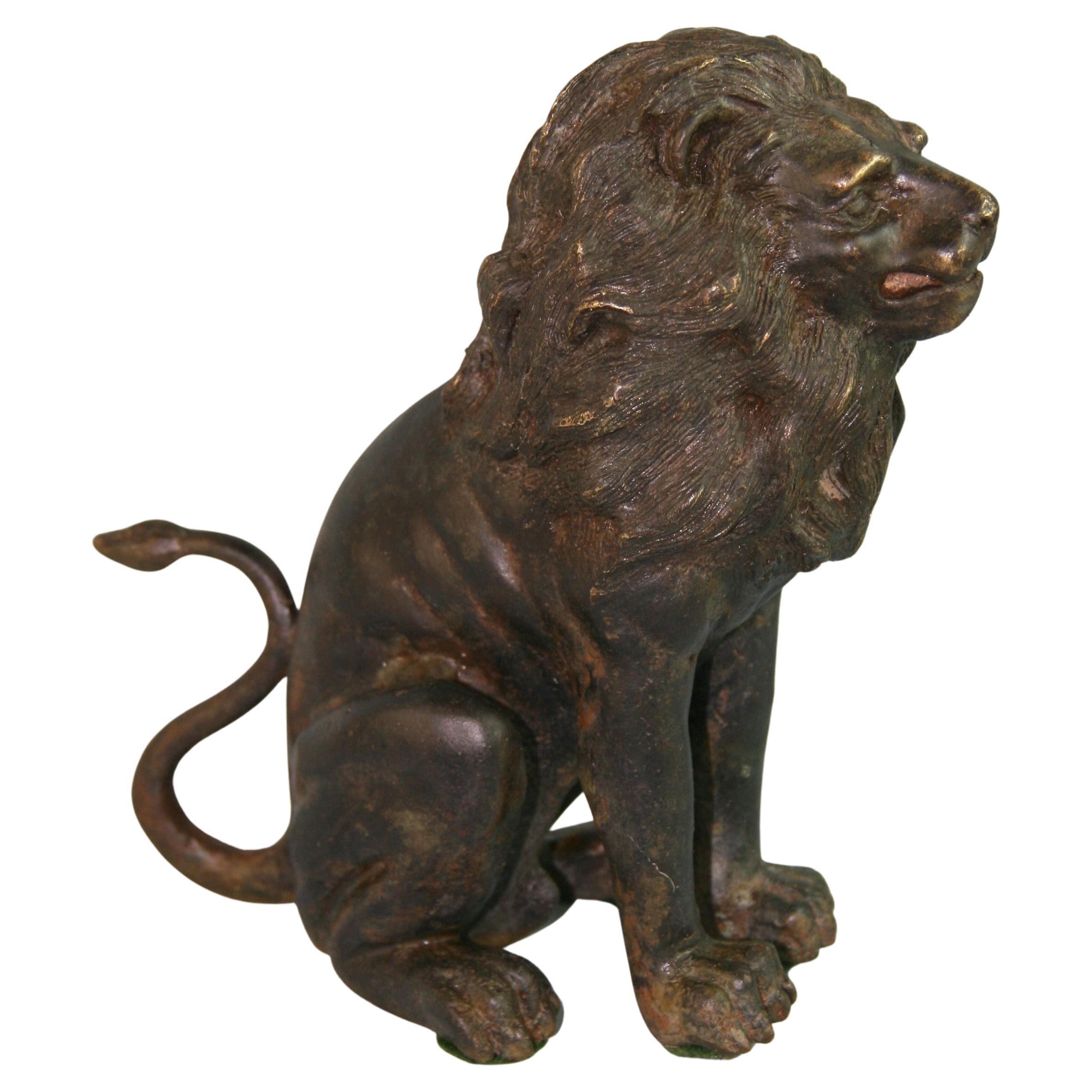 1176 Cast bronze of a male lion