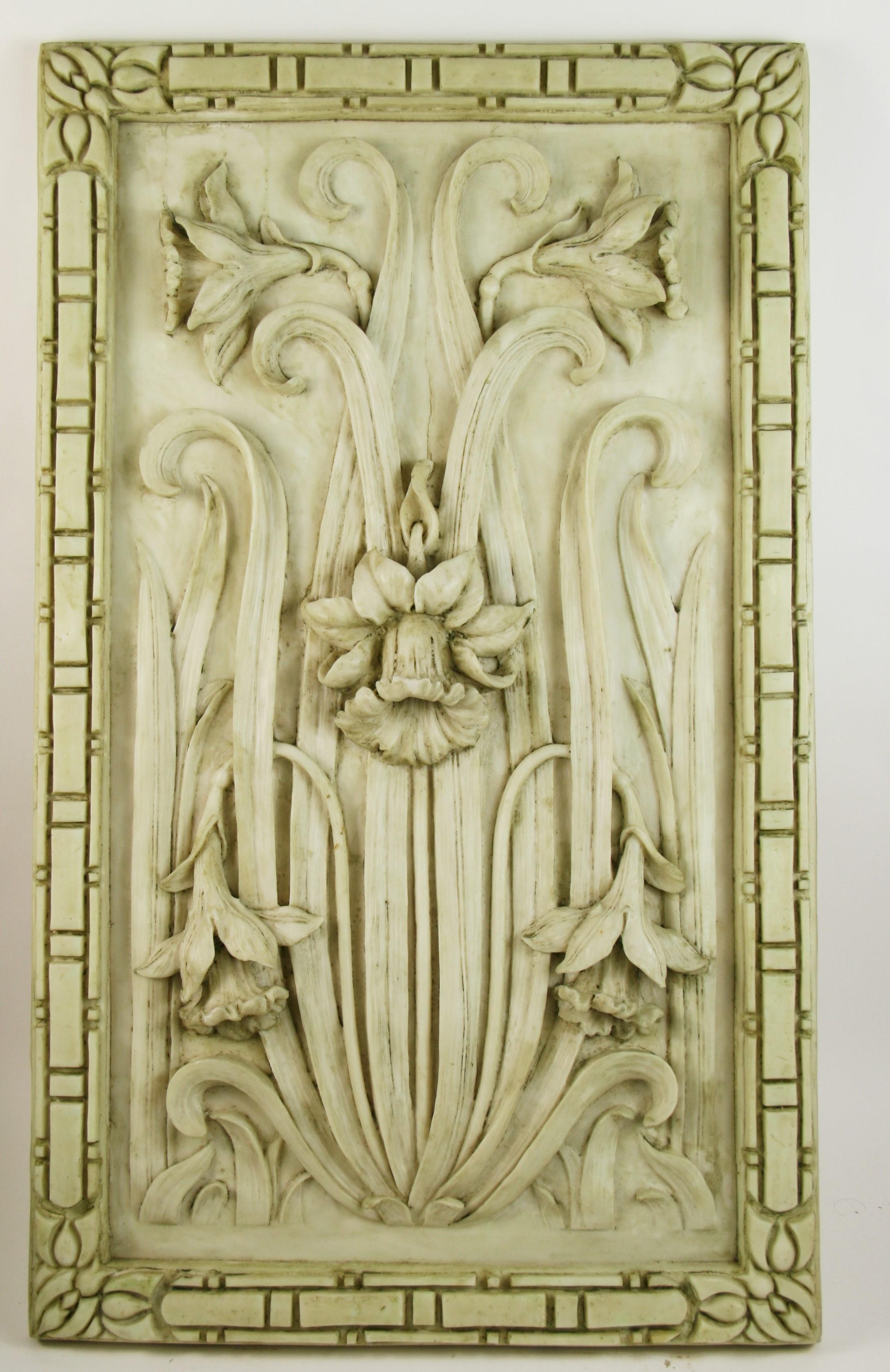 3-436ab  Italian cast resin stone daffodil architectural high relief garden wall plaque.
It is in the neoclassic style featuring daffodils can be used indoors on in the garden outdoors.
Two matching panels available 
Priced individually