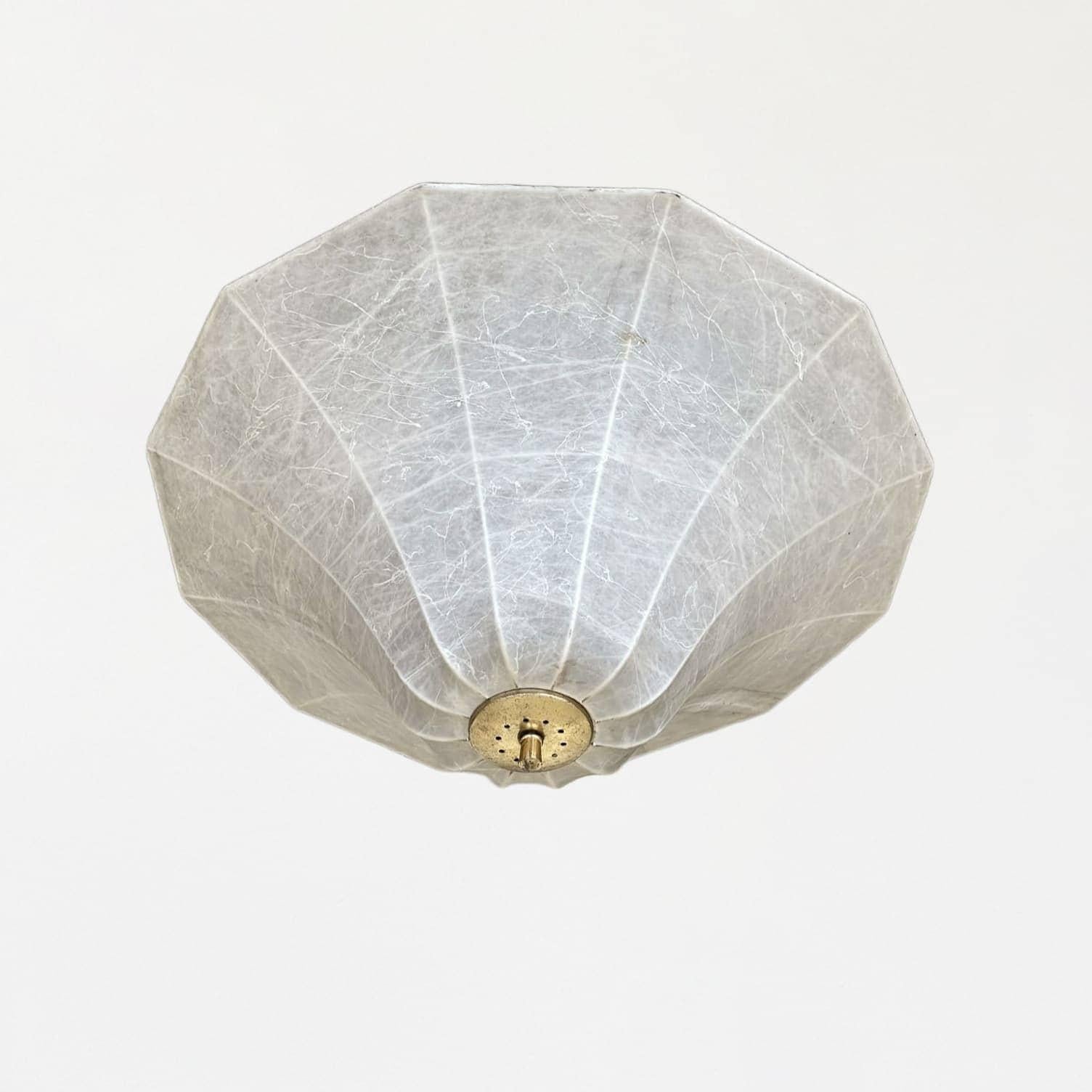 Incredible cocoon ceiling light by Achille & Pier Giacomo Castiglioni from Italy, 1960's. Unique shade in a creamy parchment resin with brass detail. Original dome resin shows nice age and some wear. New brass canopy and newly rewired with two
