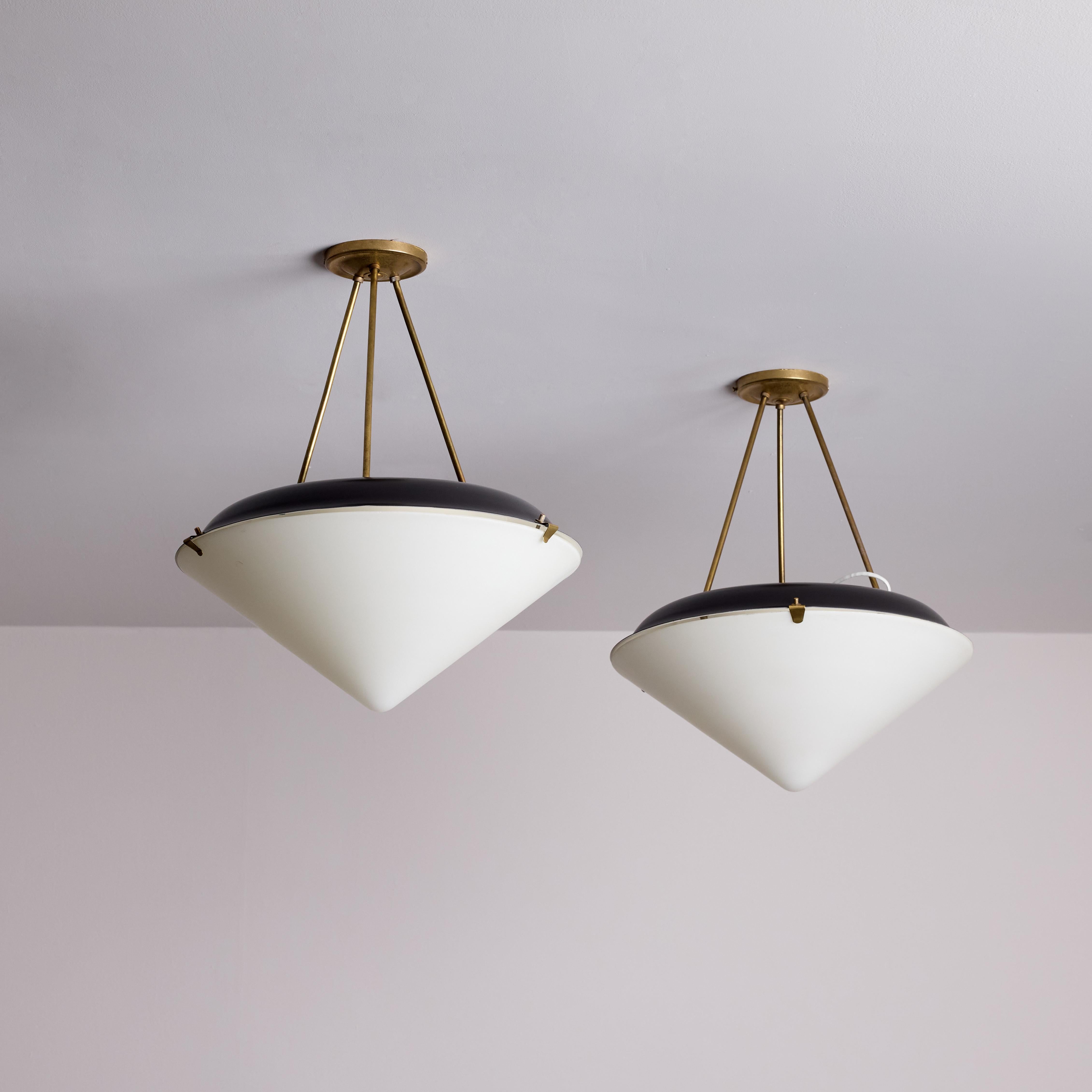 Italian ceiling lights by Stilux. Designed and manufactured in Italy, circa the 1960s. Colorful conical pendants with brass tripod canopy and opaline glass shade. Shade colors are in purple and pink. **GREY IS NOT AVAILABLE, ALREADY SOLD**  We