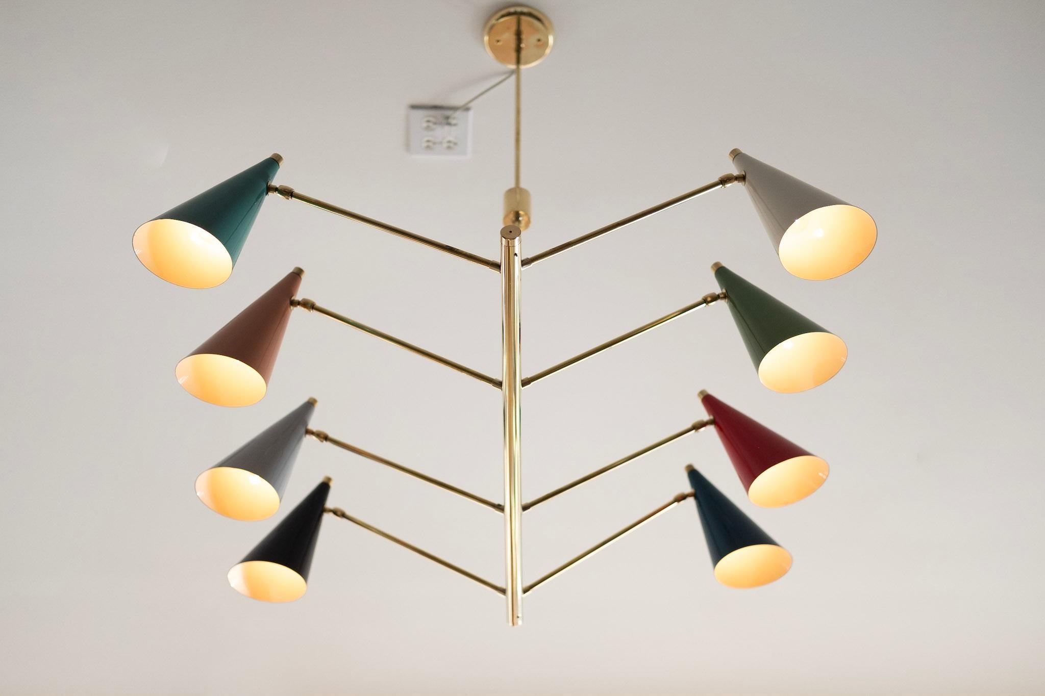 Newly produced Italian ceiling pendant with multi-color metal cone shades.
Brass stem and hardware.
Newly rewired.

Newly produced in Italy - Colors may vary - photos are examples of color possibilities/variation.