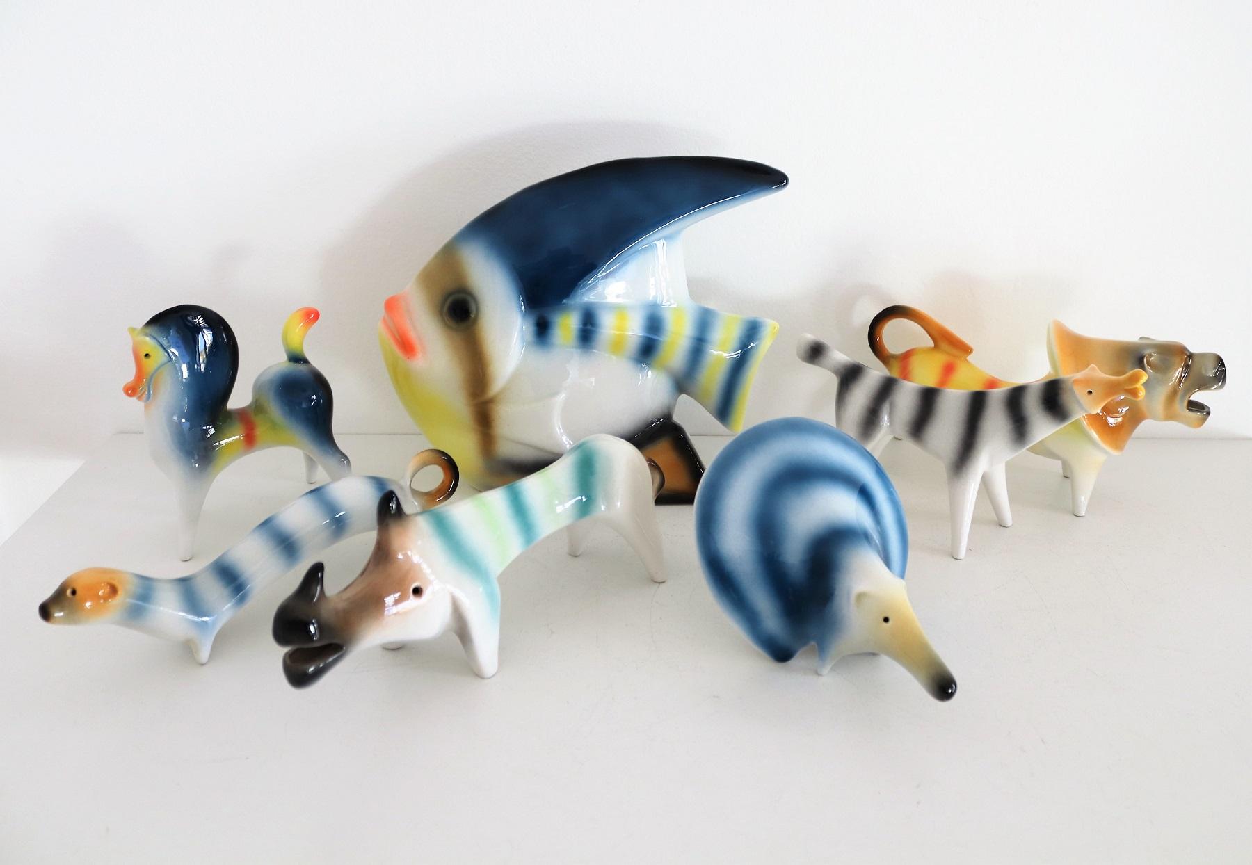 Beautiful and colorful selection of art animals made in ceramic material, Italy 1970s.
Made by Roberto Rigon, each animal is signed with RR under the ceramic.
The big fish can be used as a flower vase.
The set is composed by the following