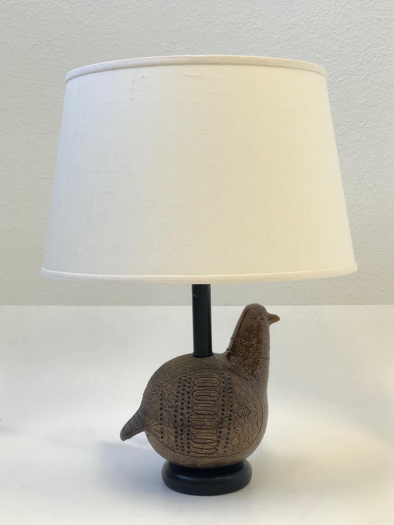 A beautiful 1970s Italian brown ceramic and brass table lamp by Bitossi.
Newly rewired with polish brass hardware and new vanilla linen shade.
Measurements: 21.25” high and 16” diameter with shade.