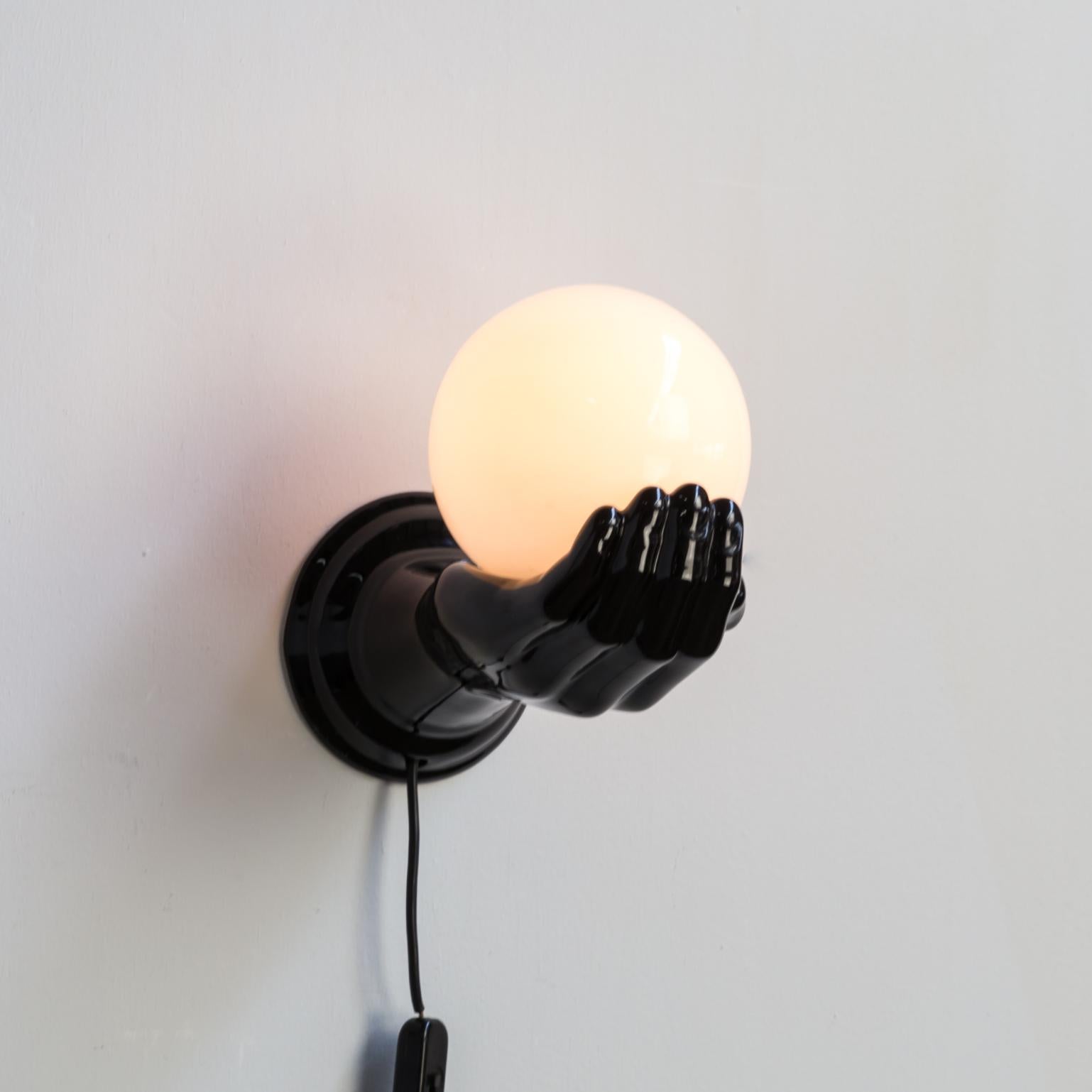 hand wall lamp