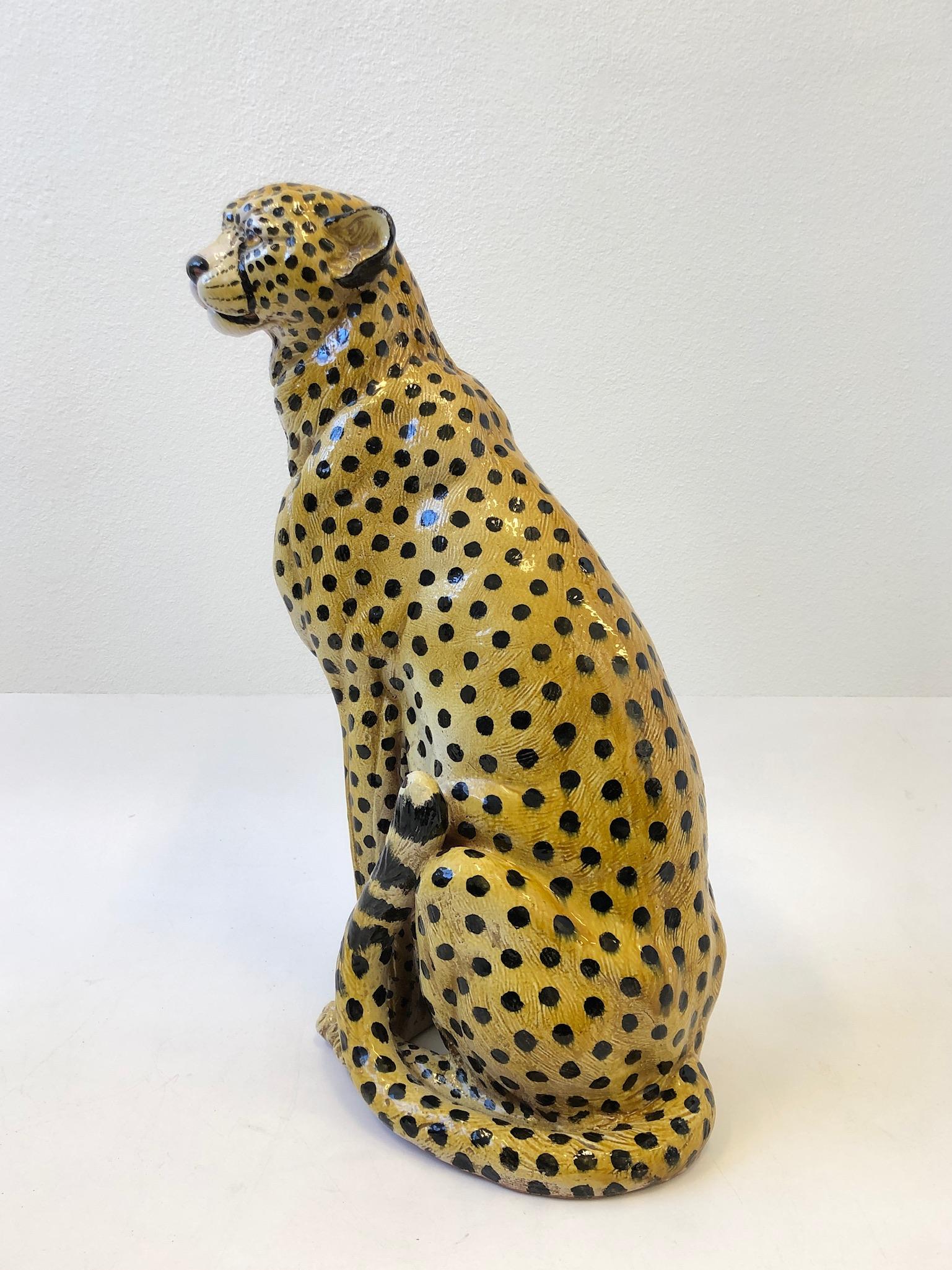 Large Italian ceramic hand painted cheetah sculpture from the 1960s. The sculpture is in beautiful condition with minor wear consistent with age (see detail photos).

Measurements: 30.5” high, 20” wide and 12” deep.