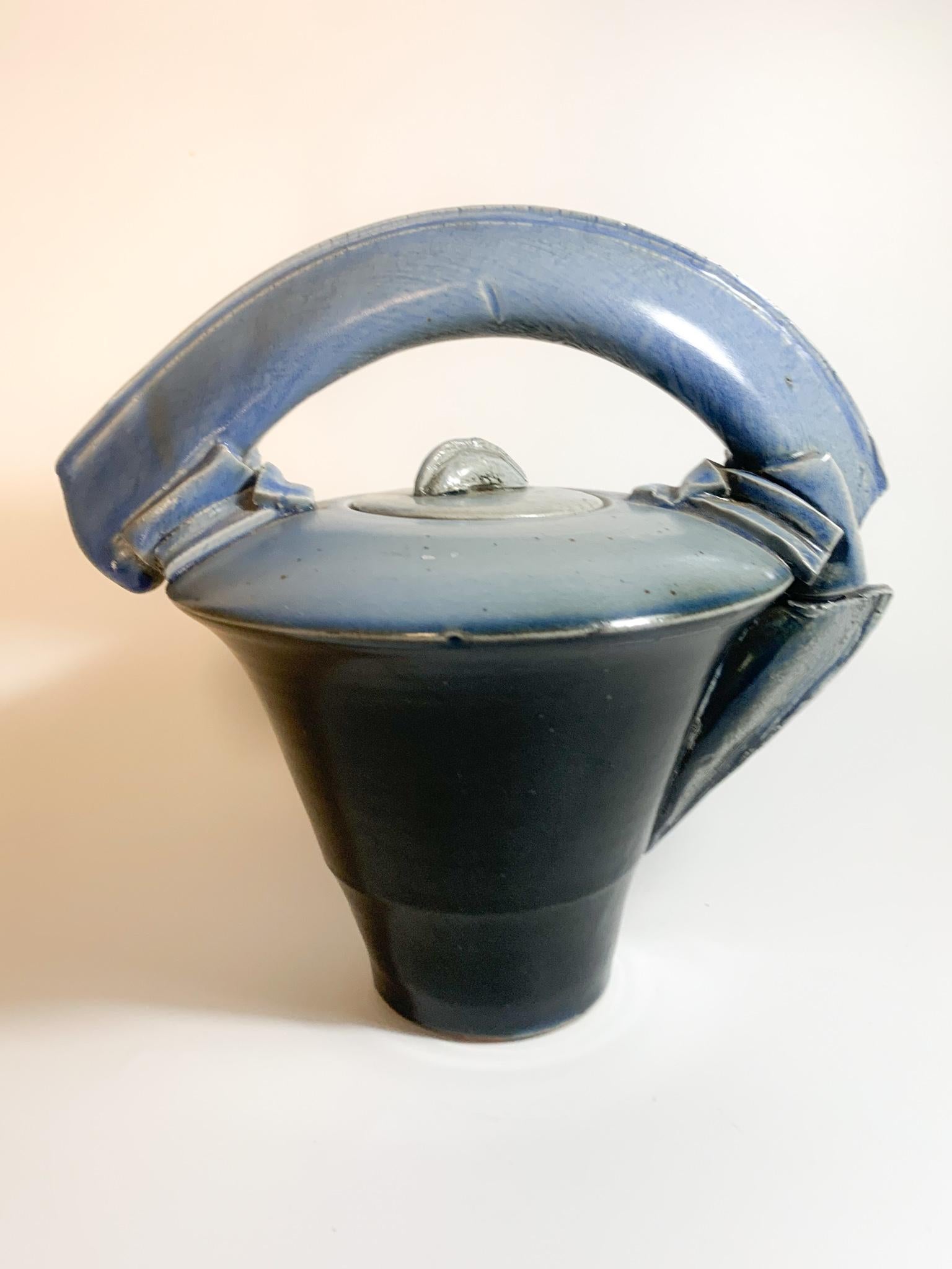 Collector's teapot in blue Italian ceramic, made in the 1950s

diameter cm 23 h cm 23