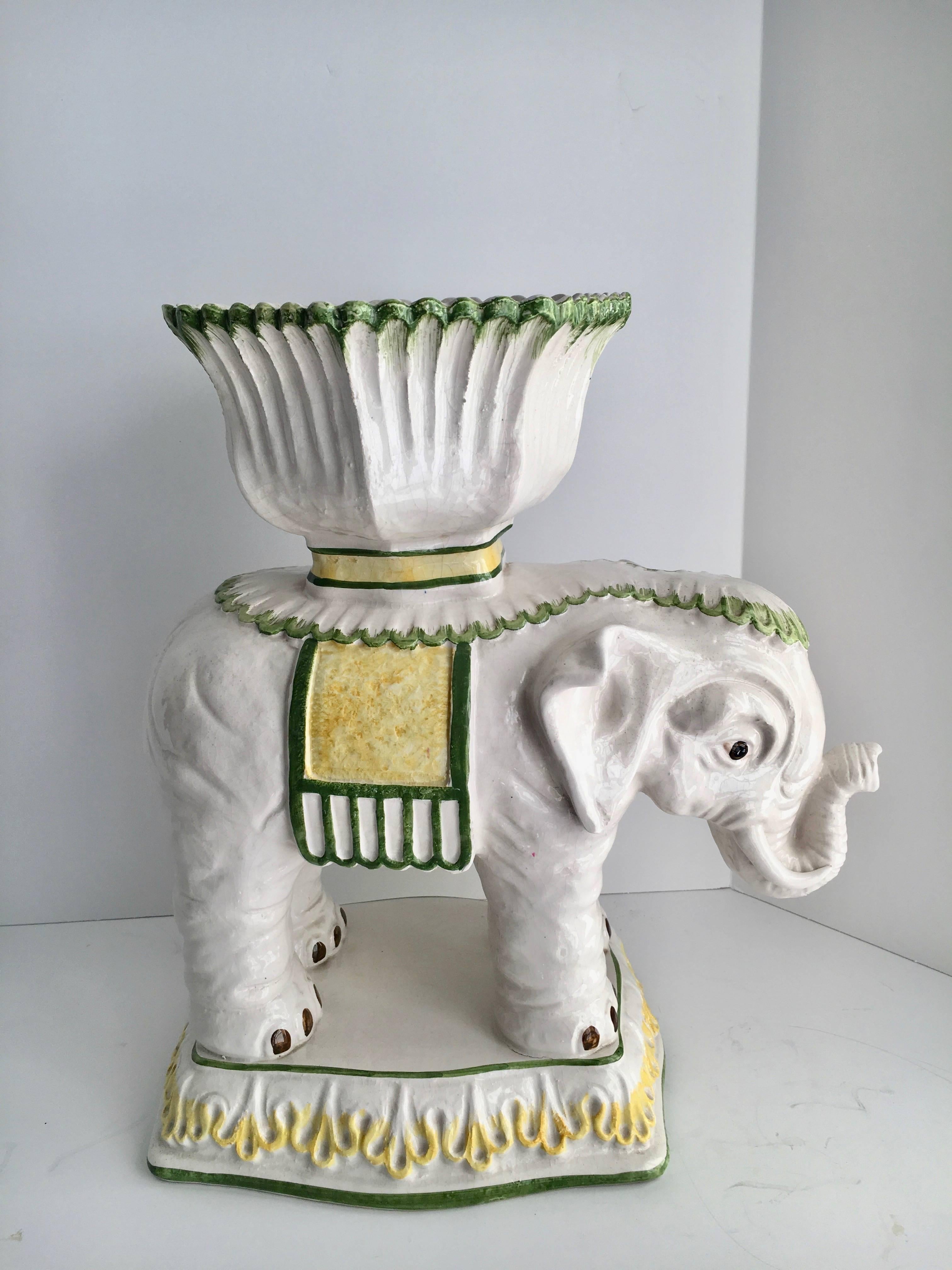 Italian ceramic elephant cachepot planter. This is a great compliment to the garden or interior as the elephant has a very large top container (8