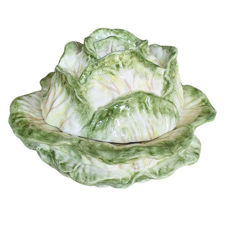 A green and white painted ceramic covered cabbageware serving bowl after Dodie Thayer. A mid-century modern staple of many hostesses, cabbageware is the perfect way to add a pop of color to any tabletop. This particular piece is by Abigails of
