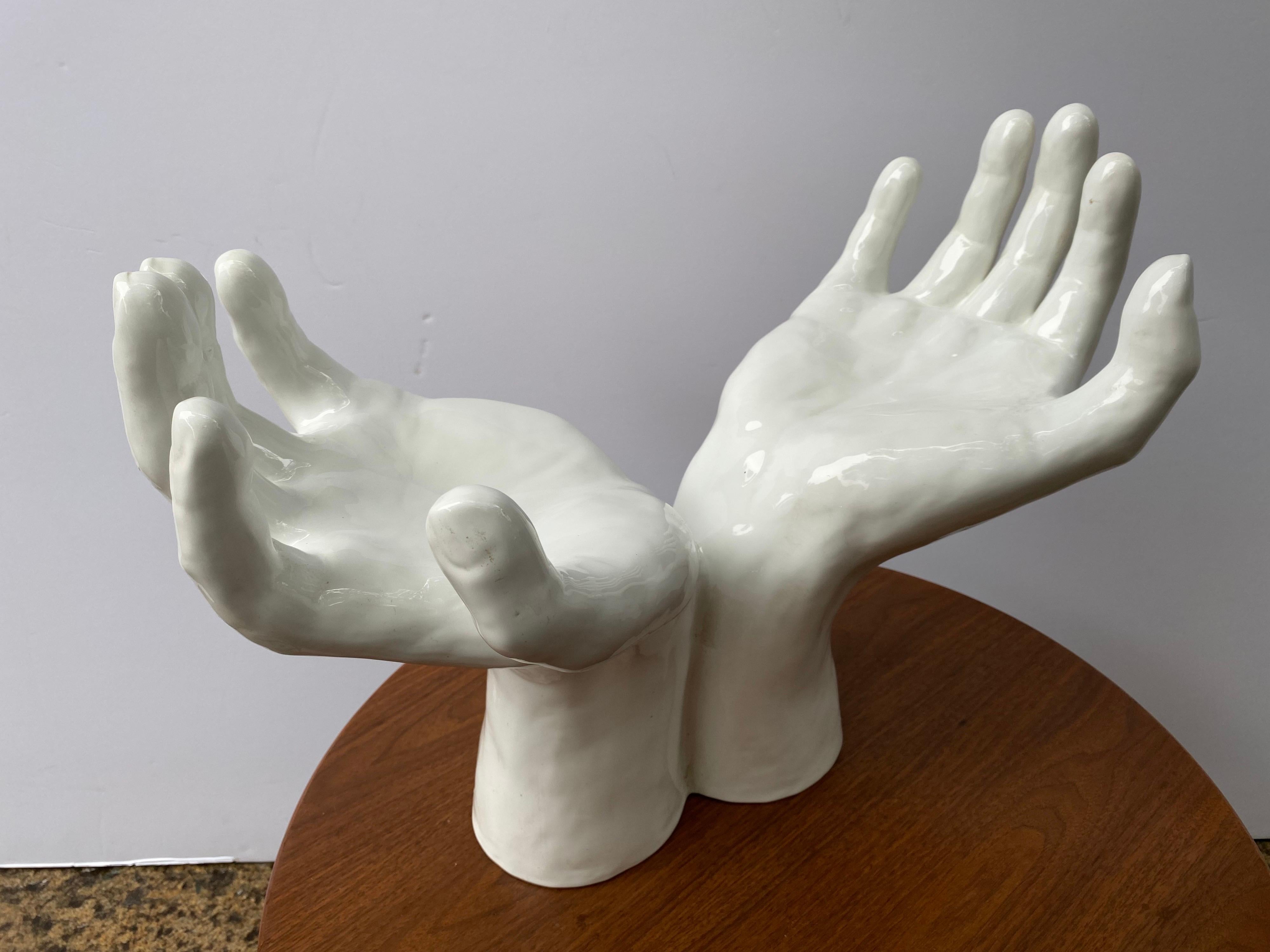 Italian ceramic hands sculpture. Large outreaching hands, measuring 22