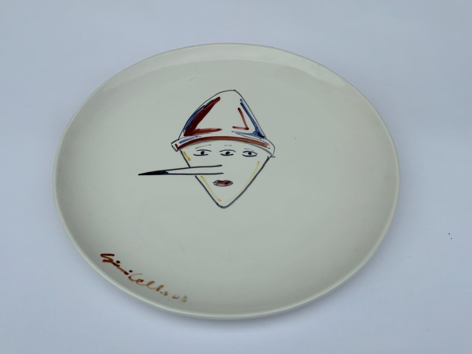Ceramic plate designed and produced by Gianni Cella. Signed. Unique piece.

Biography
Born and raised in Pavia, Gianni Cella's early training took place first at the Liceo Artistico Raffaello Sanzio in Pavia and later at the Brera Academy of Fine
