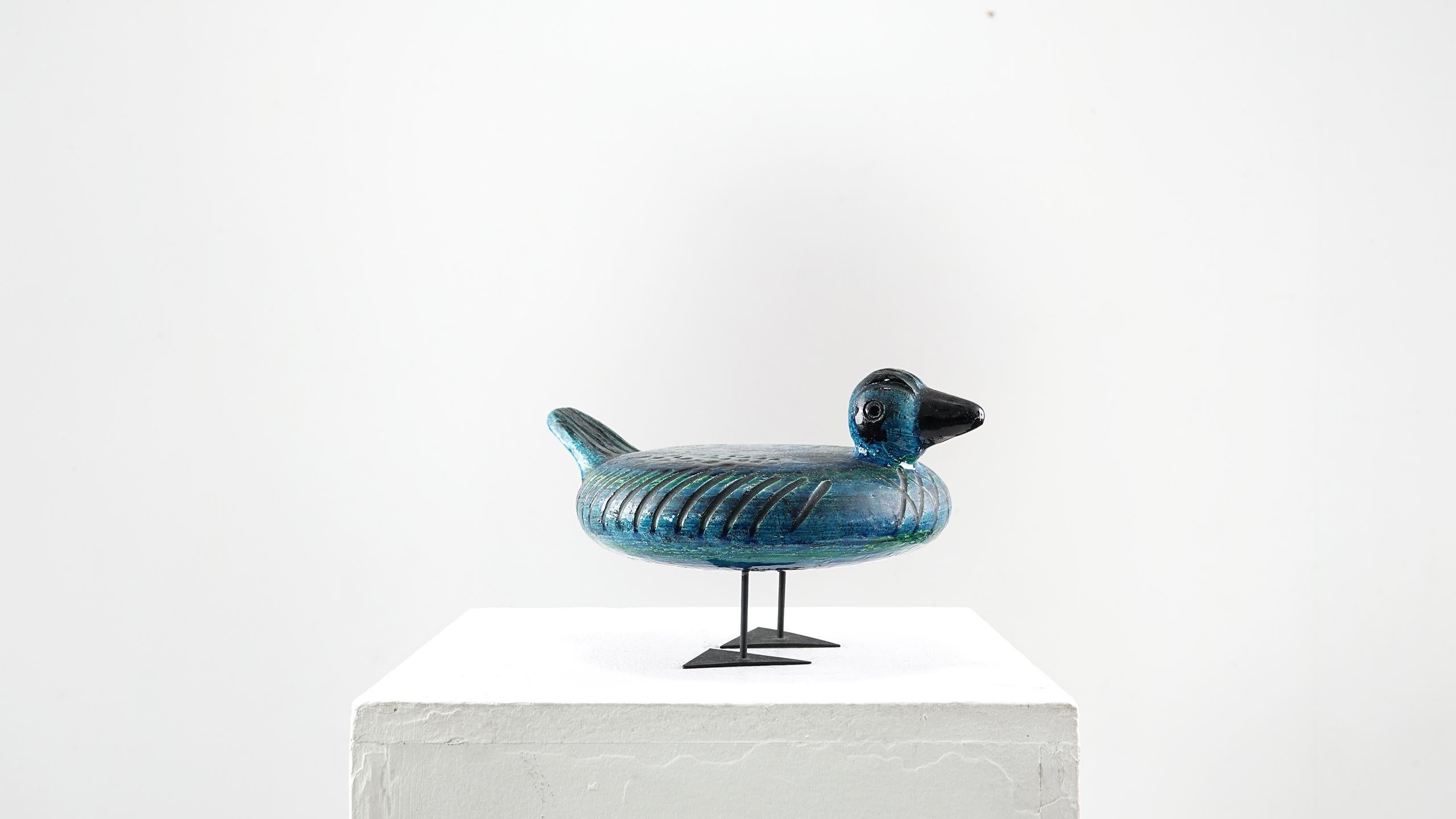 A beautiful rare Italian ceramic duck by Aldo Londi for Raymor from 1960s.
The duck is from the “Rimini Blue” collection, it’s sign made in Italy. The Duck is constructed of ceramic that is glazed and the feet is steel lacquered black.
  