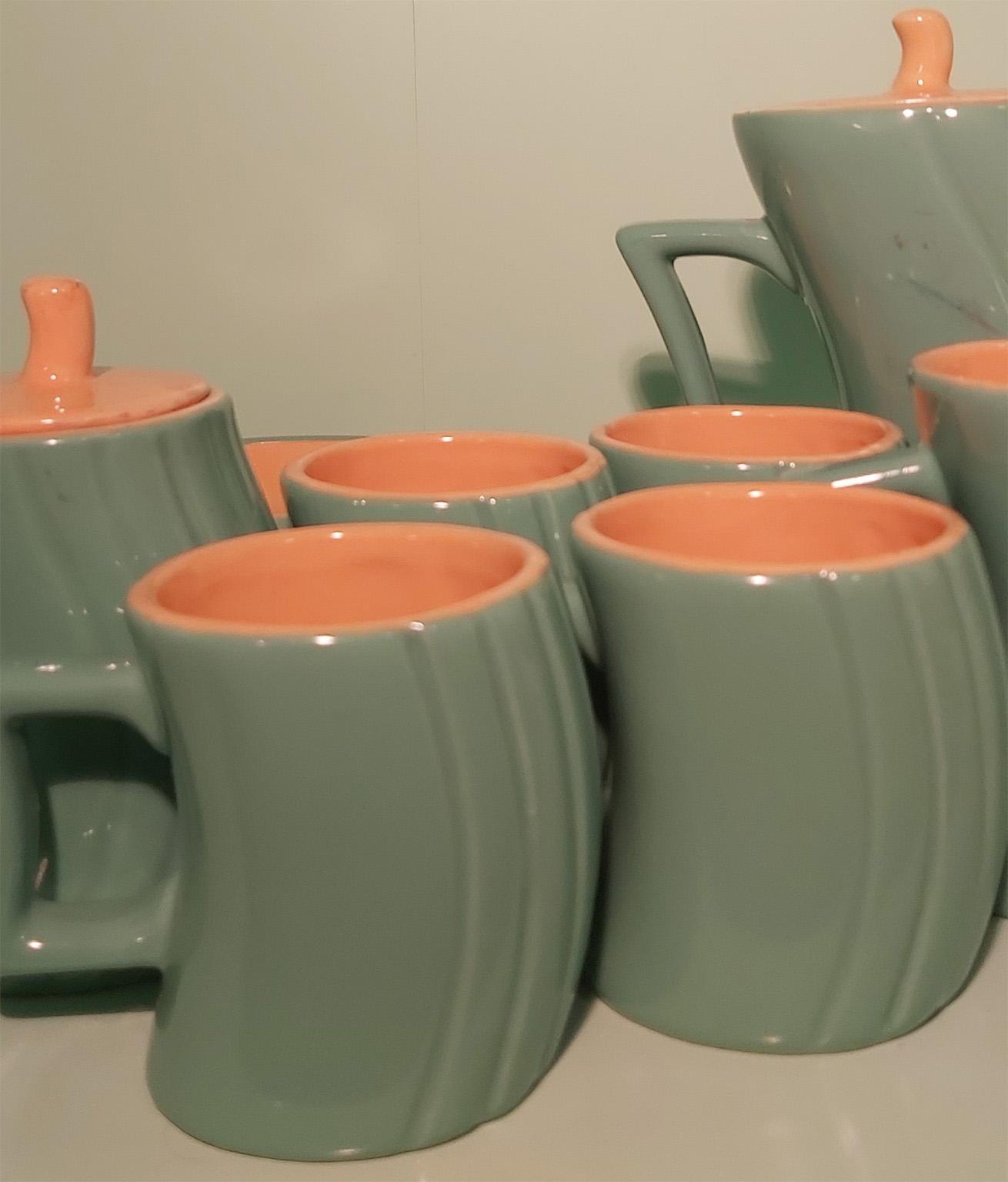 Beautiful tea and coffee ceramic set “Memphis” designed in 1985 by Massimo Iosa Ghini for Naj Oleari in 1985.
Green ceramic with ocra inside. Amazing curved design.
Signed Naj Oleari.
See
Naj Oleary Milano factory history.
 
    