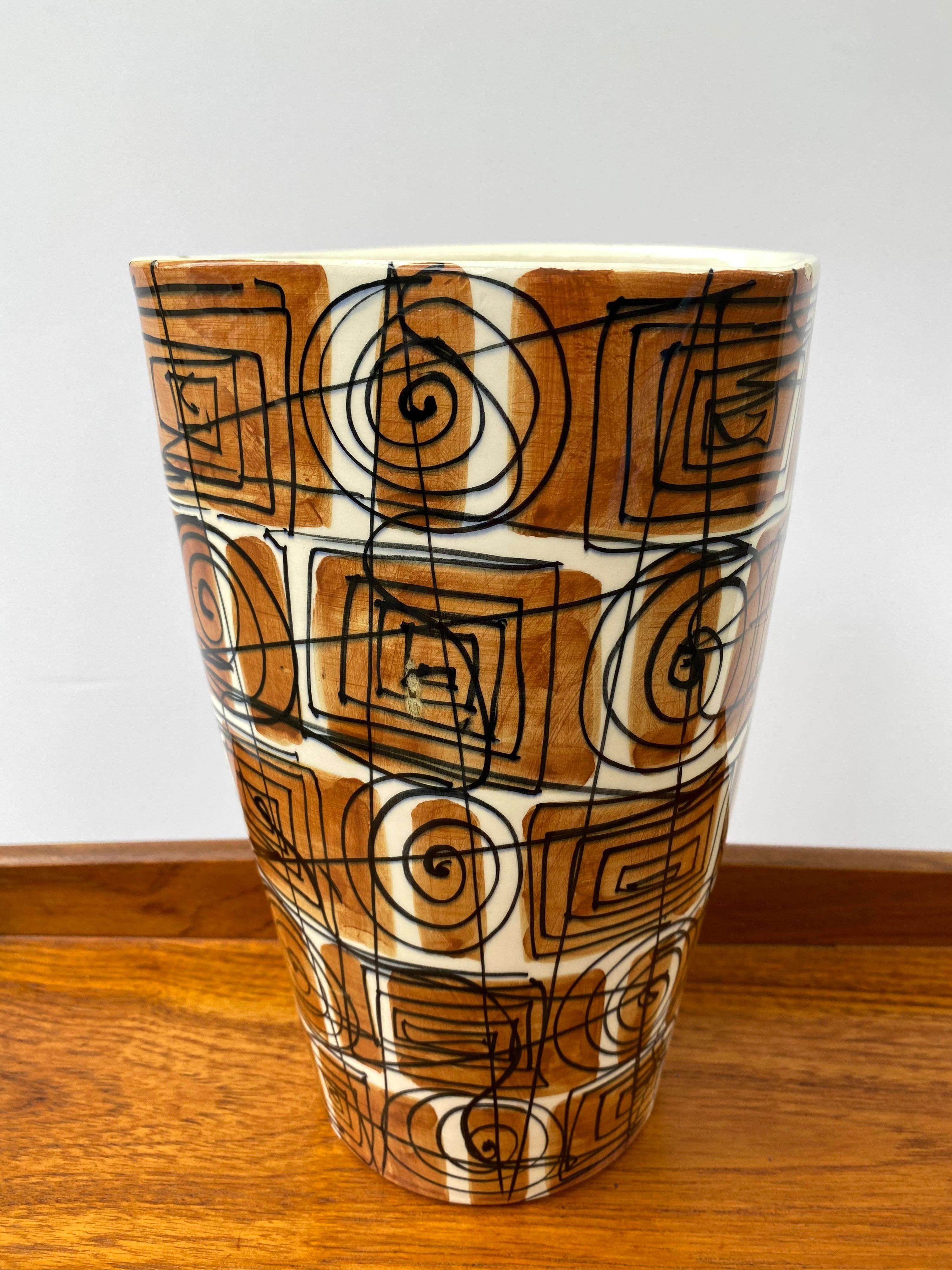 Italian ceramic vase for Raymor. Abstract black circle design over areas of brown. 9.5