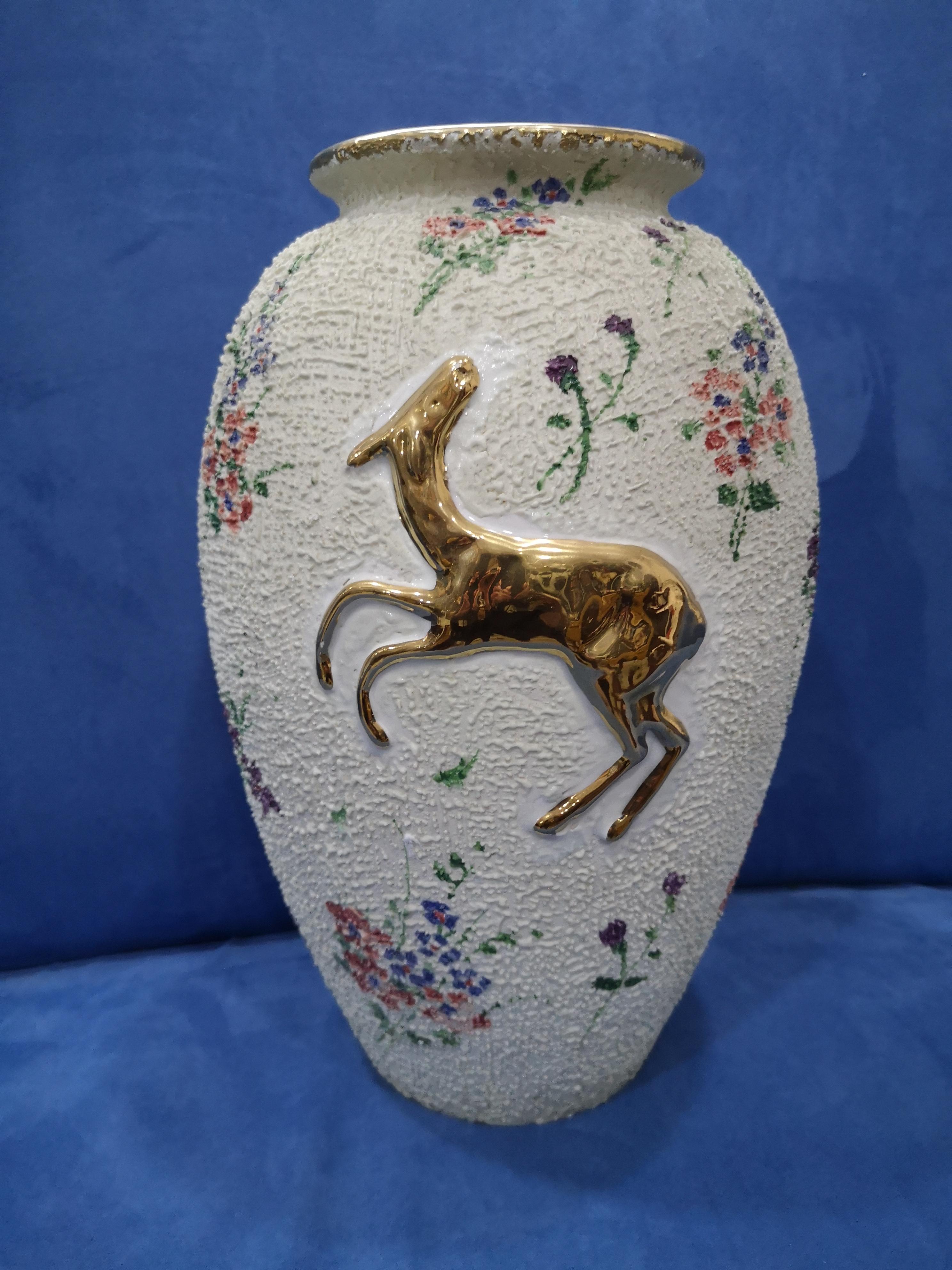 Very rare ceramic vase from the FACI CC factory (Fabbrica Ceramiche Artistiche Italiane di Civita Castellana), active from 1926 to 1967 and founded by Adolfo Brunelli. The vase has a curled finish and depicts a deer on both sides and is marked 