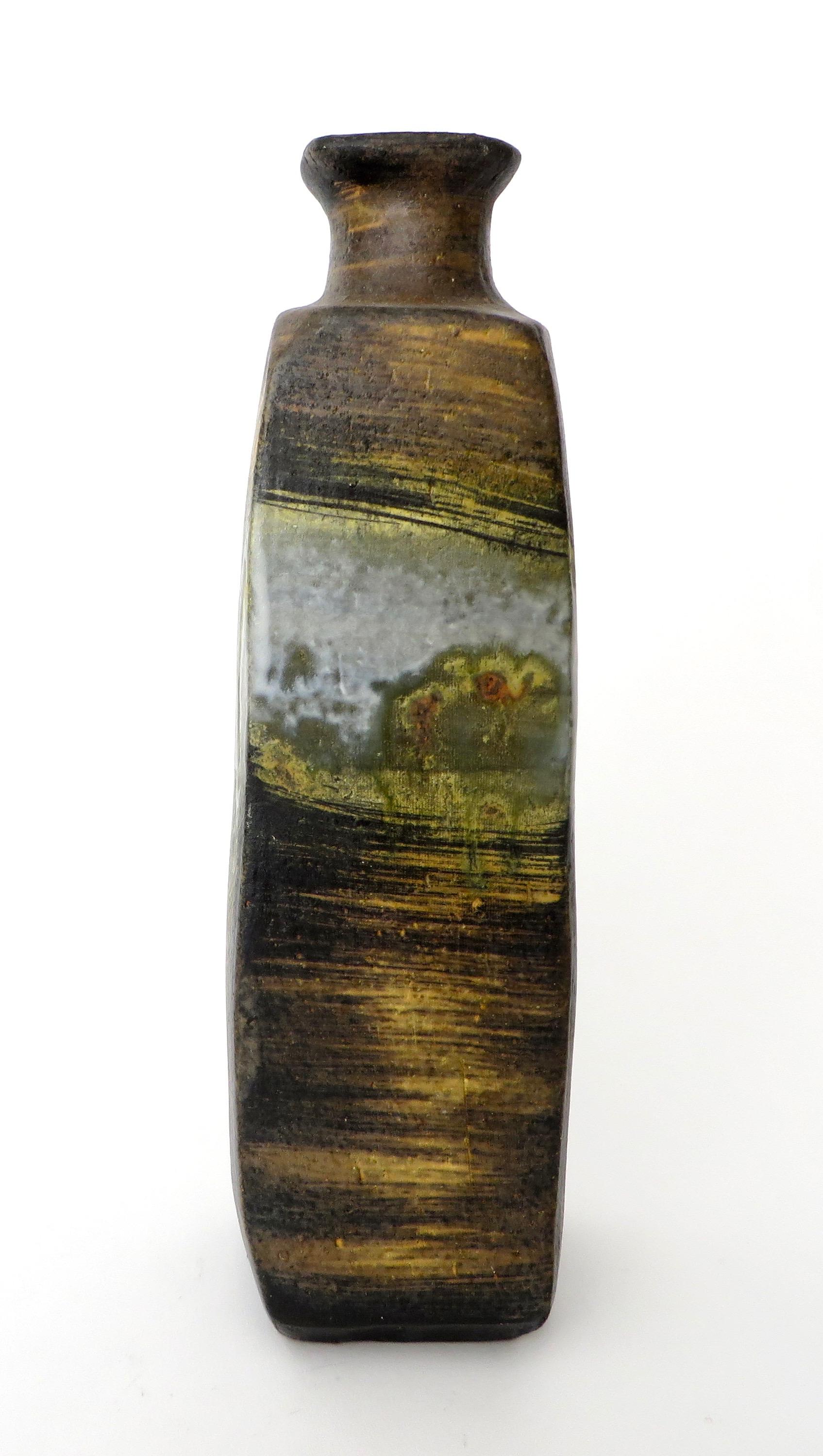 Beautiful and unusual painterly glazed ceramic vase by Marcello Fantoni.
Very expressive use of the glaze in evidence of the artists burst of the hand with the brush.
This piece is signed and marked to the underside of the base, Fantoni Italy for
