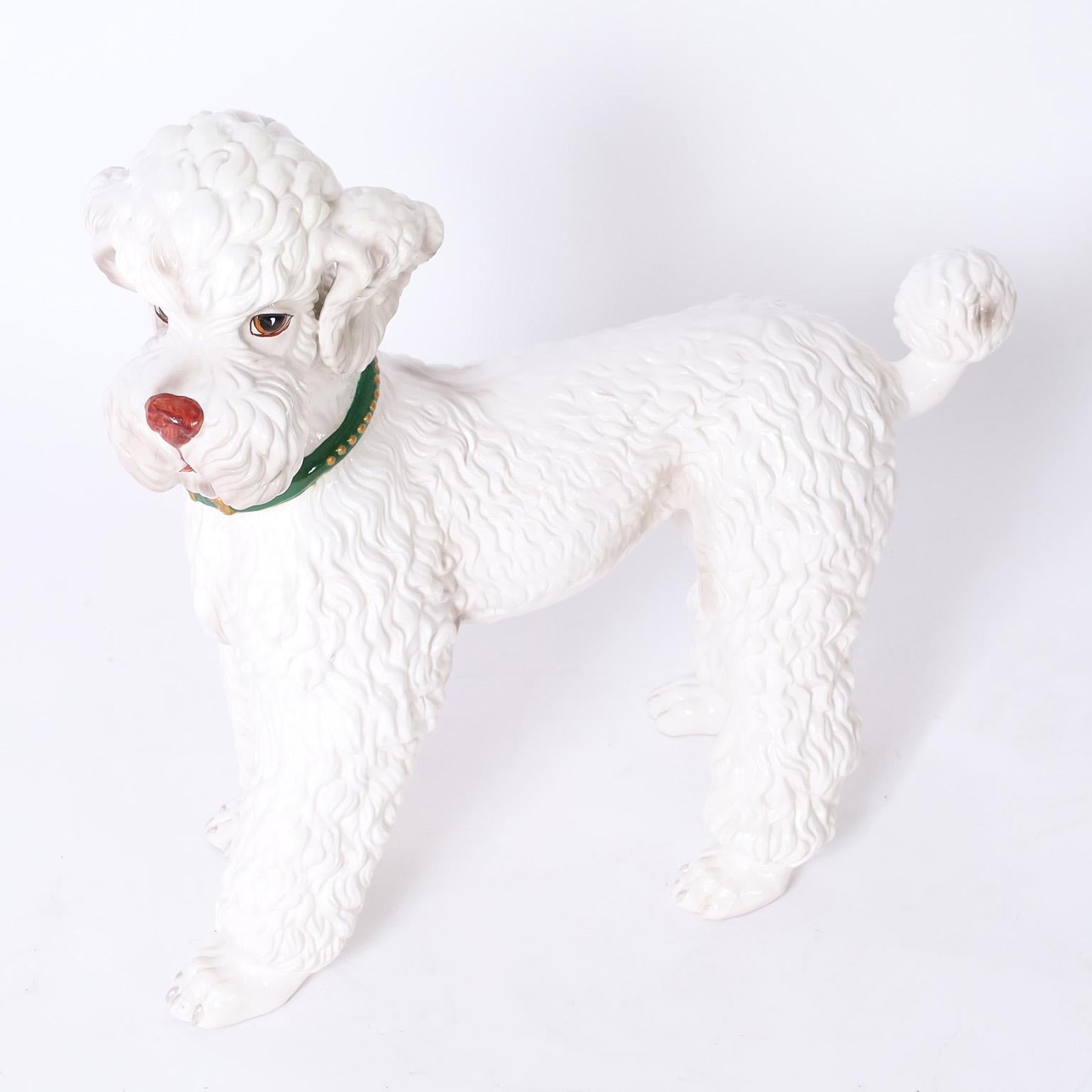 Life size vintage poodle sculpture crafted in ceramic, decorated and glazed with aplomb. Interesting note on the bottom of a paw.