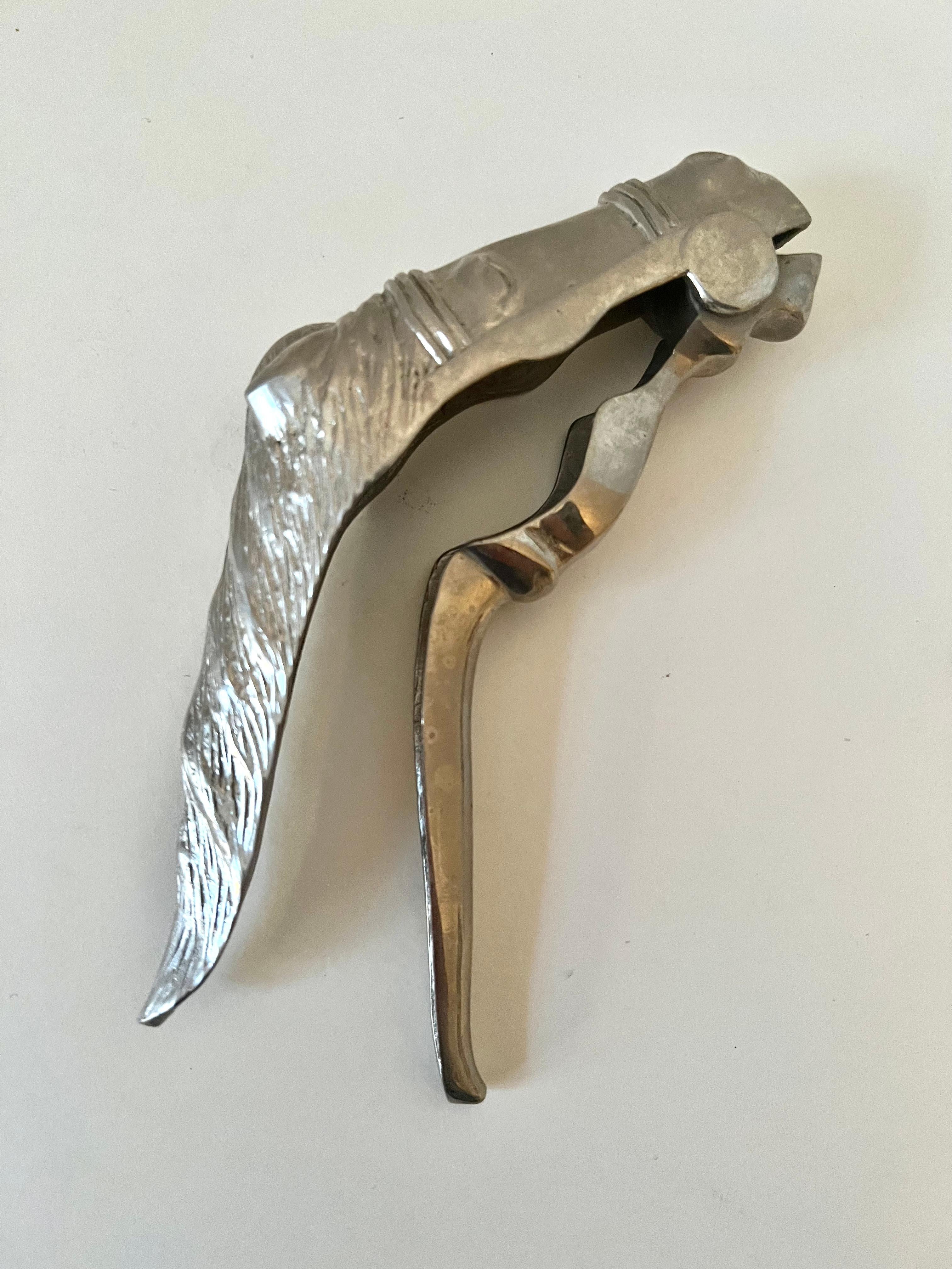 Silver plate nut cracker by Cesare Piccini Italy.  The piece may have been a GWP?  Cesare Piccini is known for fine hand bags.  

I lovely practical piece or an be purely decorative.

Great for the holidays,,. a hostess gift or housewarming