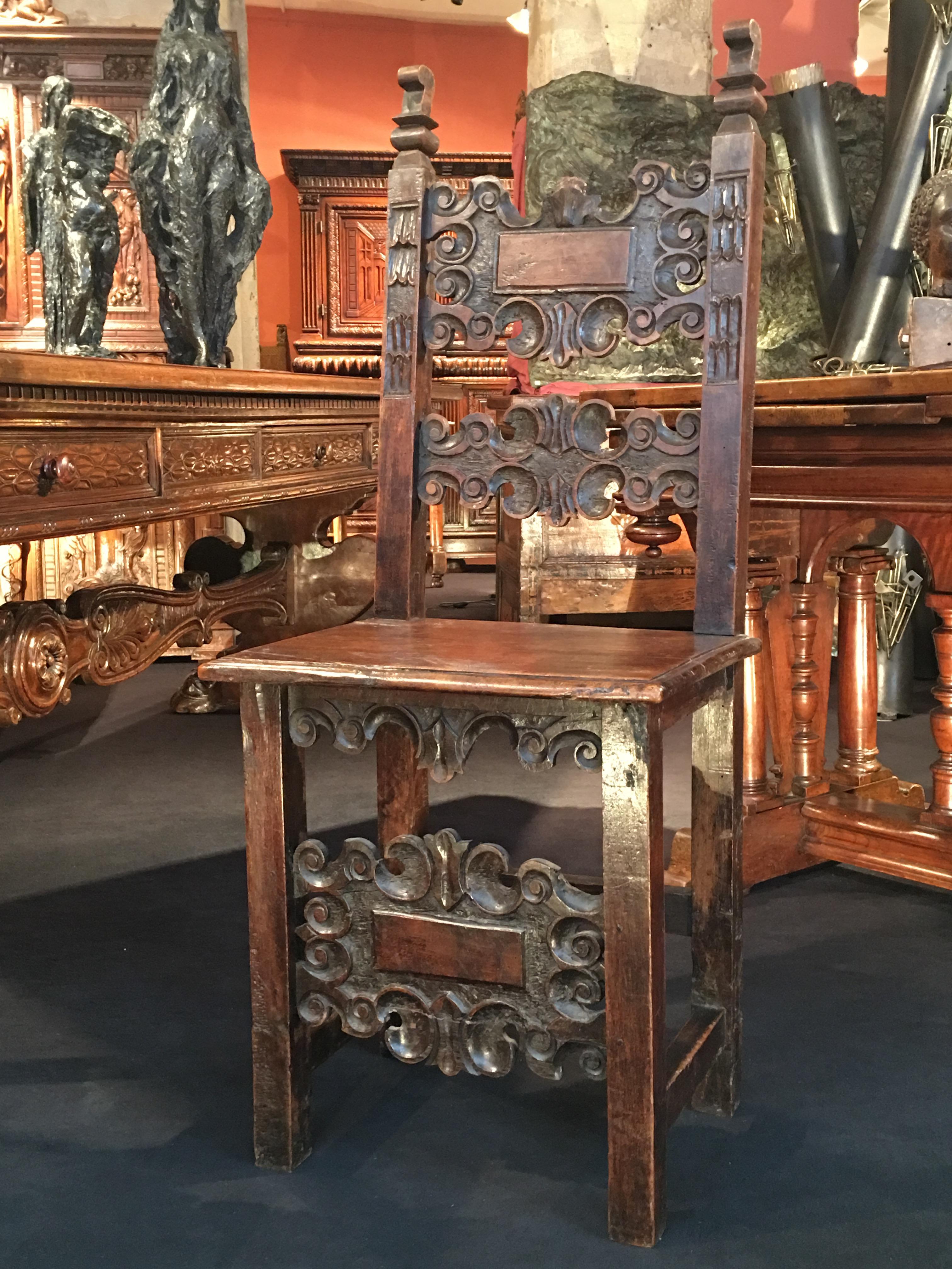 Origin: Italy, Tuscany
Period: Late 16th century

Measures: Height 122 cm
Seat 49.5 x 36 cm

Walnut wood
Very good condition

High-backed Italian chair with wood marquetry, decorated with scrolls.
 