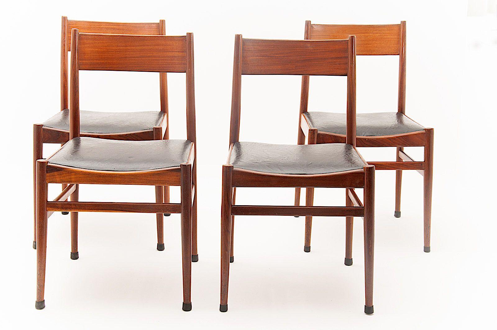 This 6 chairs look like midcentury Scandinavian design, but in fact they are Italian, and, were manufactured by Consorzio Sedie Friuli. The frame is in teak, of witch patterns are close to rosewood. The seat in black Vynil, and in vintage condition.
