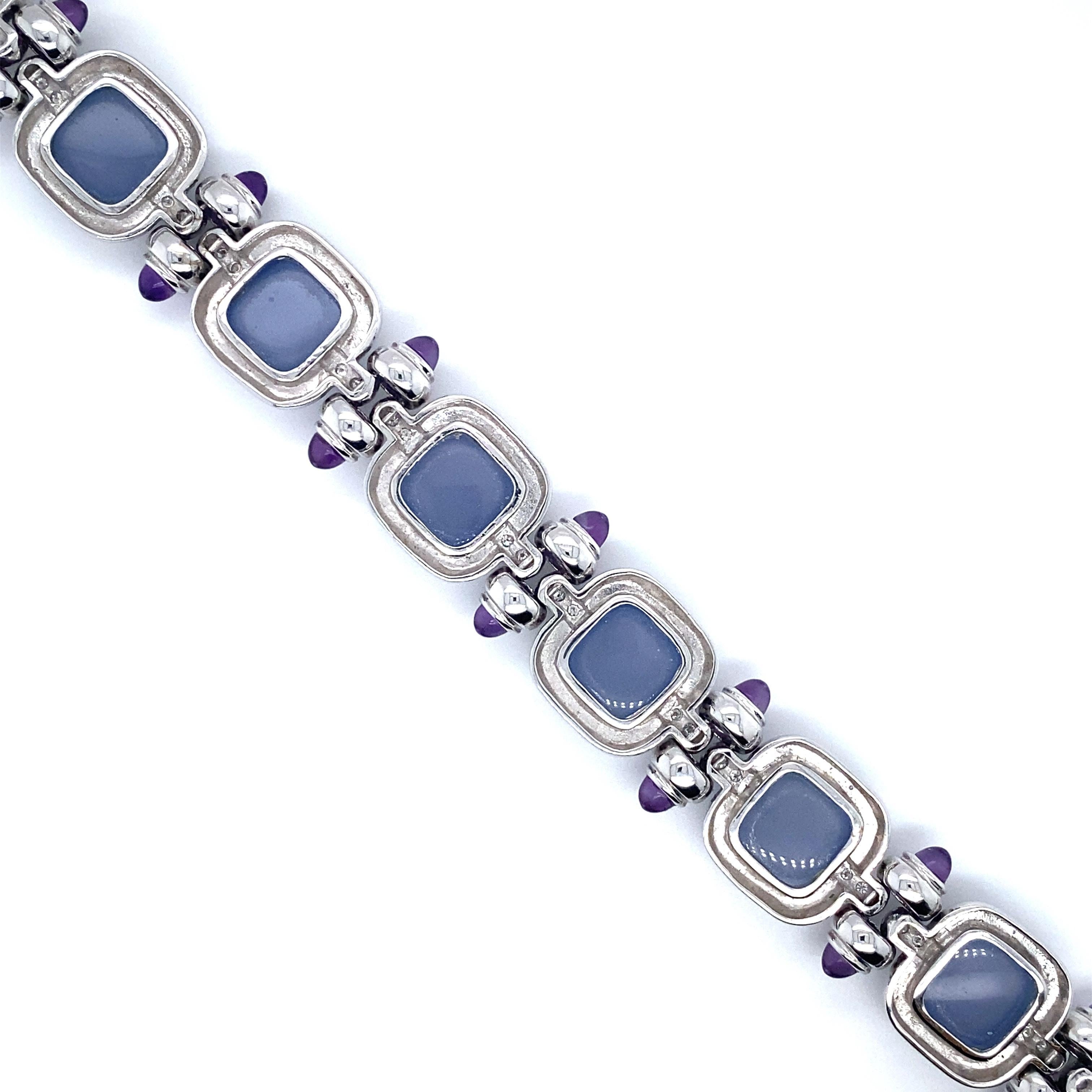 Item Details: This spectacular bracelet crafted in 14k white gold features purple chalcedony, amethyst stones and diamond accents.

Circa: 2000s
Metal Type: 14 Karat White Gold
Weight: 39.4 grams
Size: 7.25
