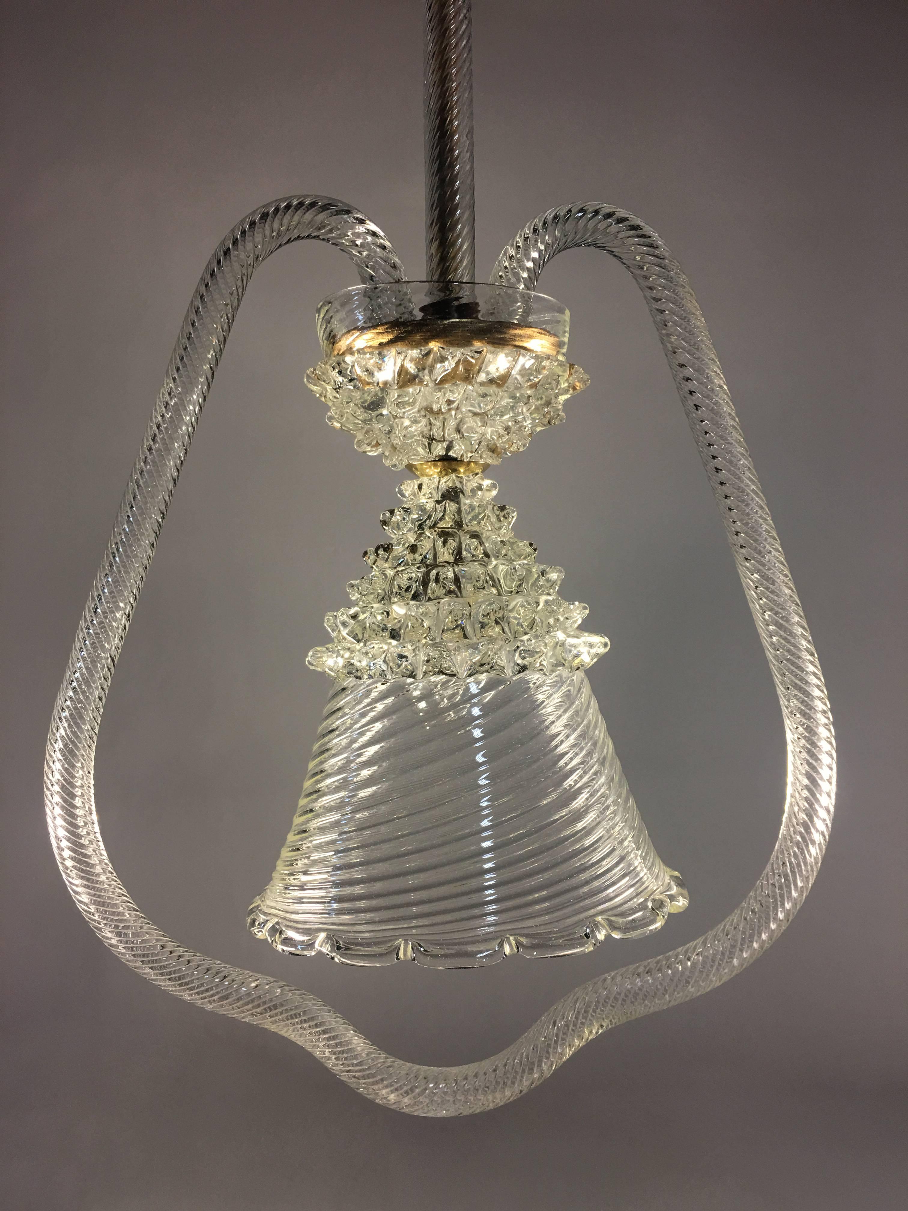 Chandelier with sober and elegant shapes. An authentic jewel out of the Murano furnaces.
 