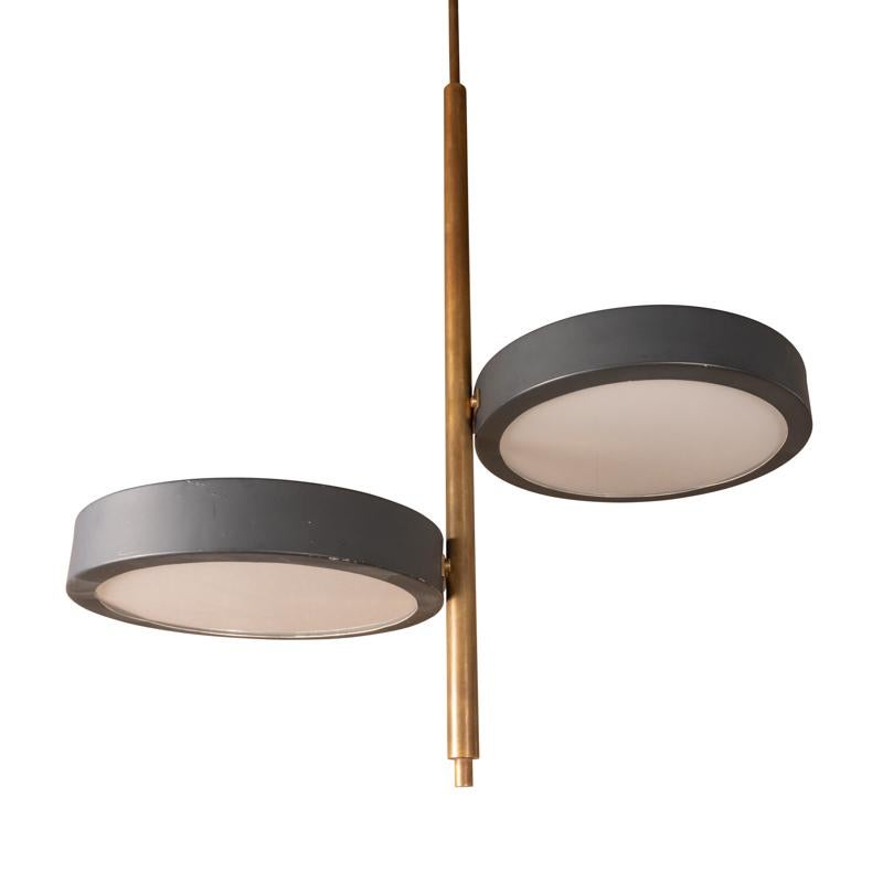 Italian chandelier by Bruno Gatta for Stilnovo, central stem in gilded brass with 2 black-lacquered aluminum rings and frosted glass.
Italy circa 1960.

Height 92 cm - 36,22 po
Width 53 cm - 20,87 po