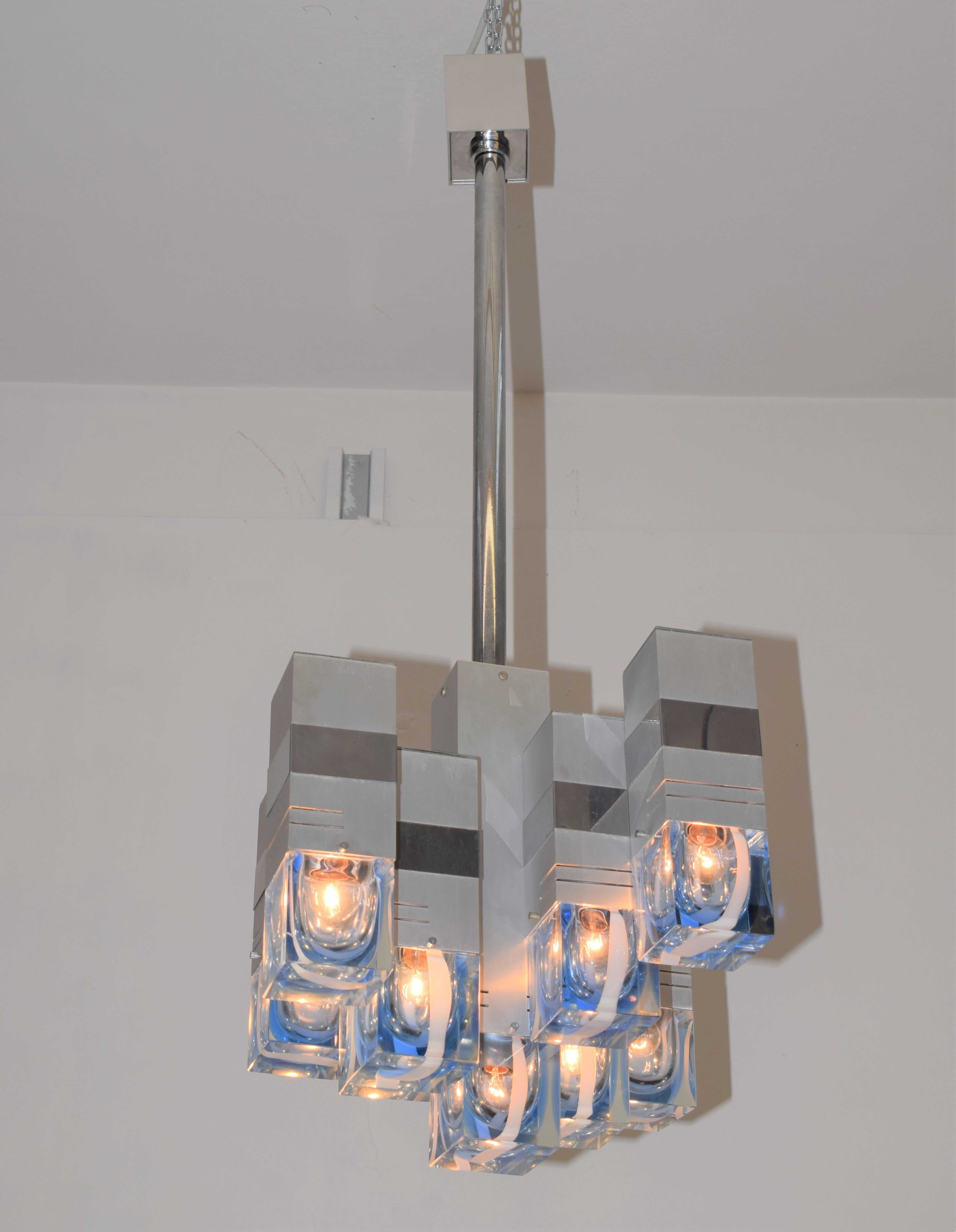 Italian chandelier by Gaetano Sciolari, 1970s.

Dimensions: H= 110 cm; W= 40 cm; D= 40 cm.