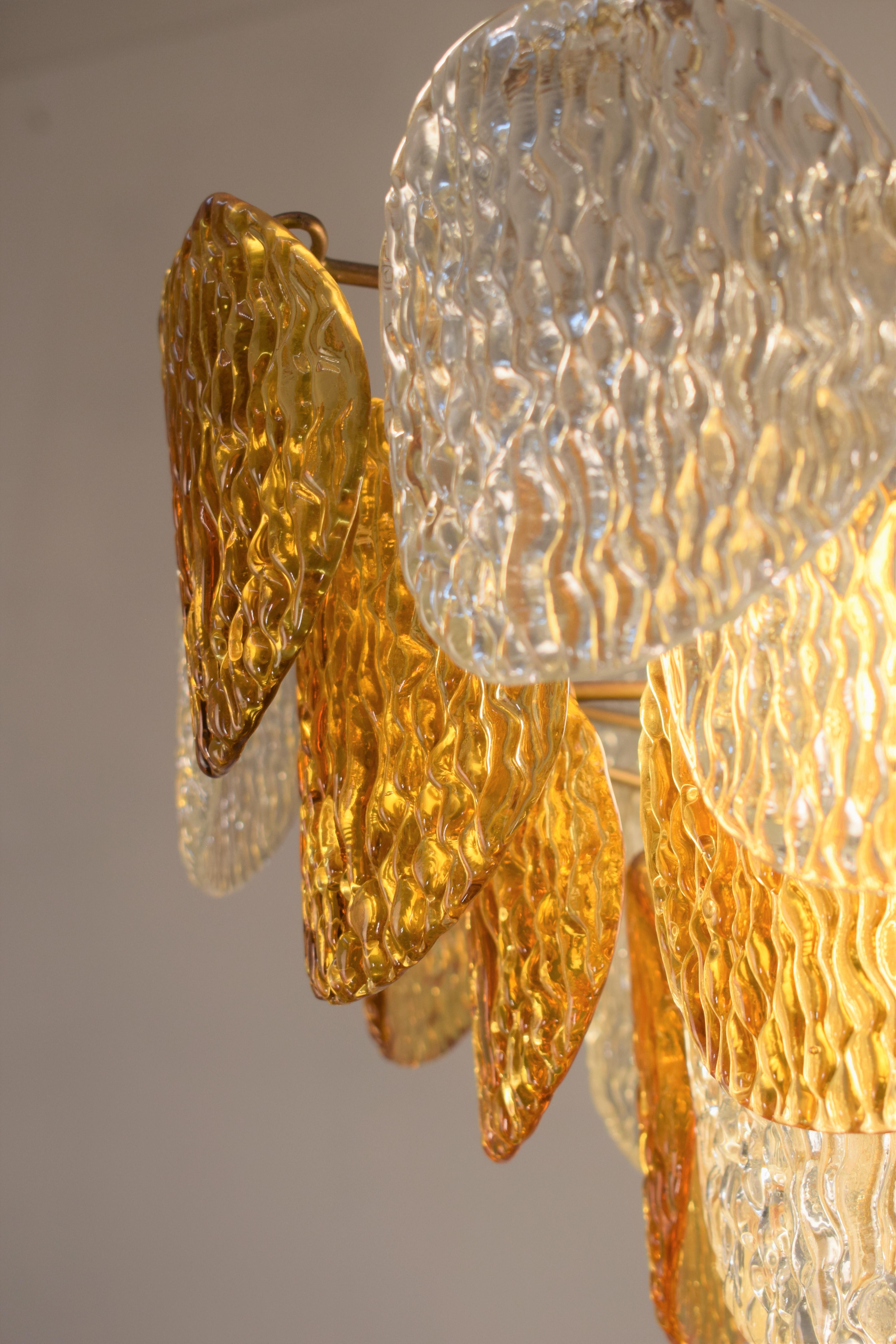 Italian chandelier by Mazzega, 1960s.

Dimensions: H= 105 cm; D= 48 cm.