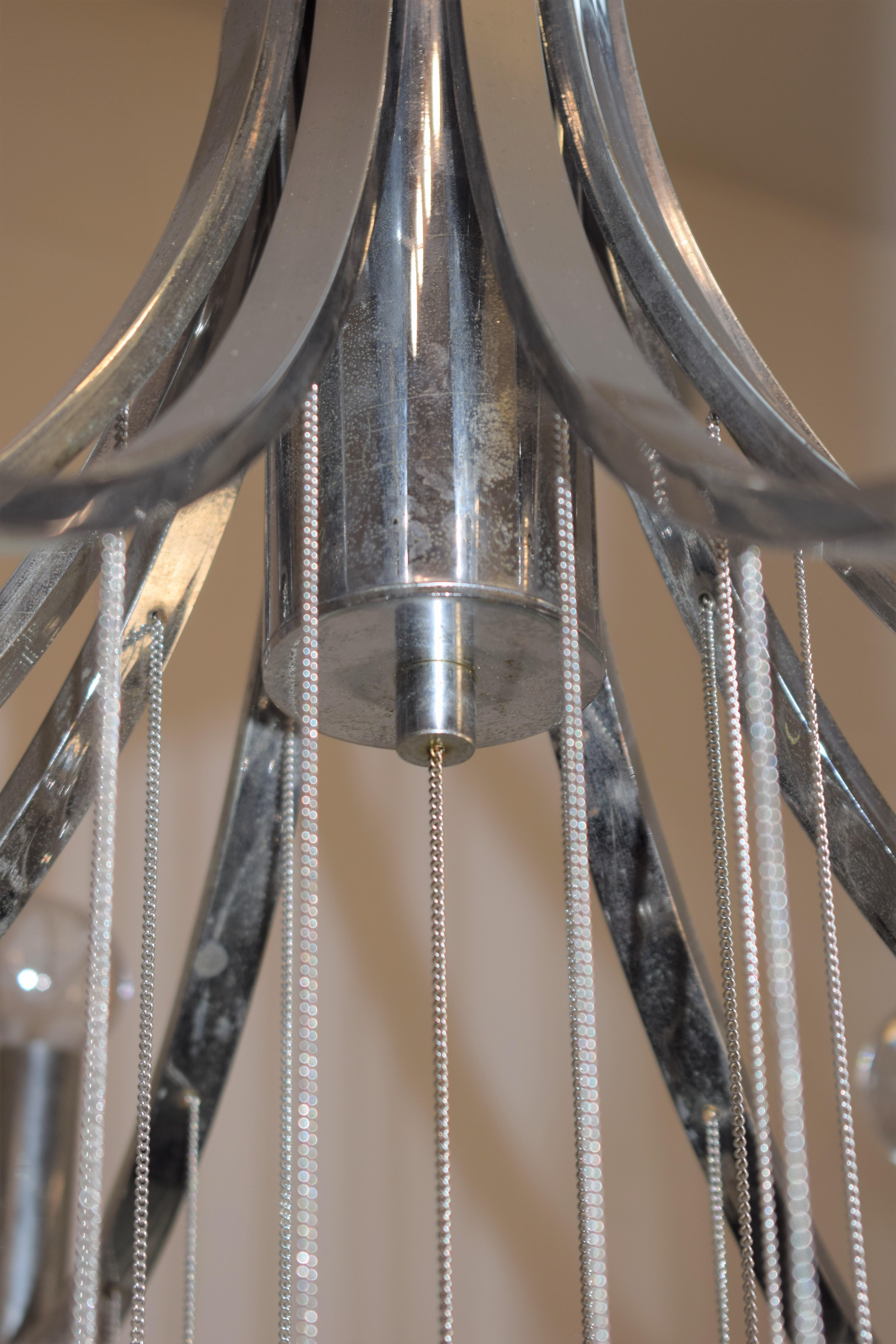 Steel Italian chandelier by Sciolari, 1970s. For Sale