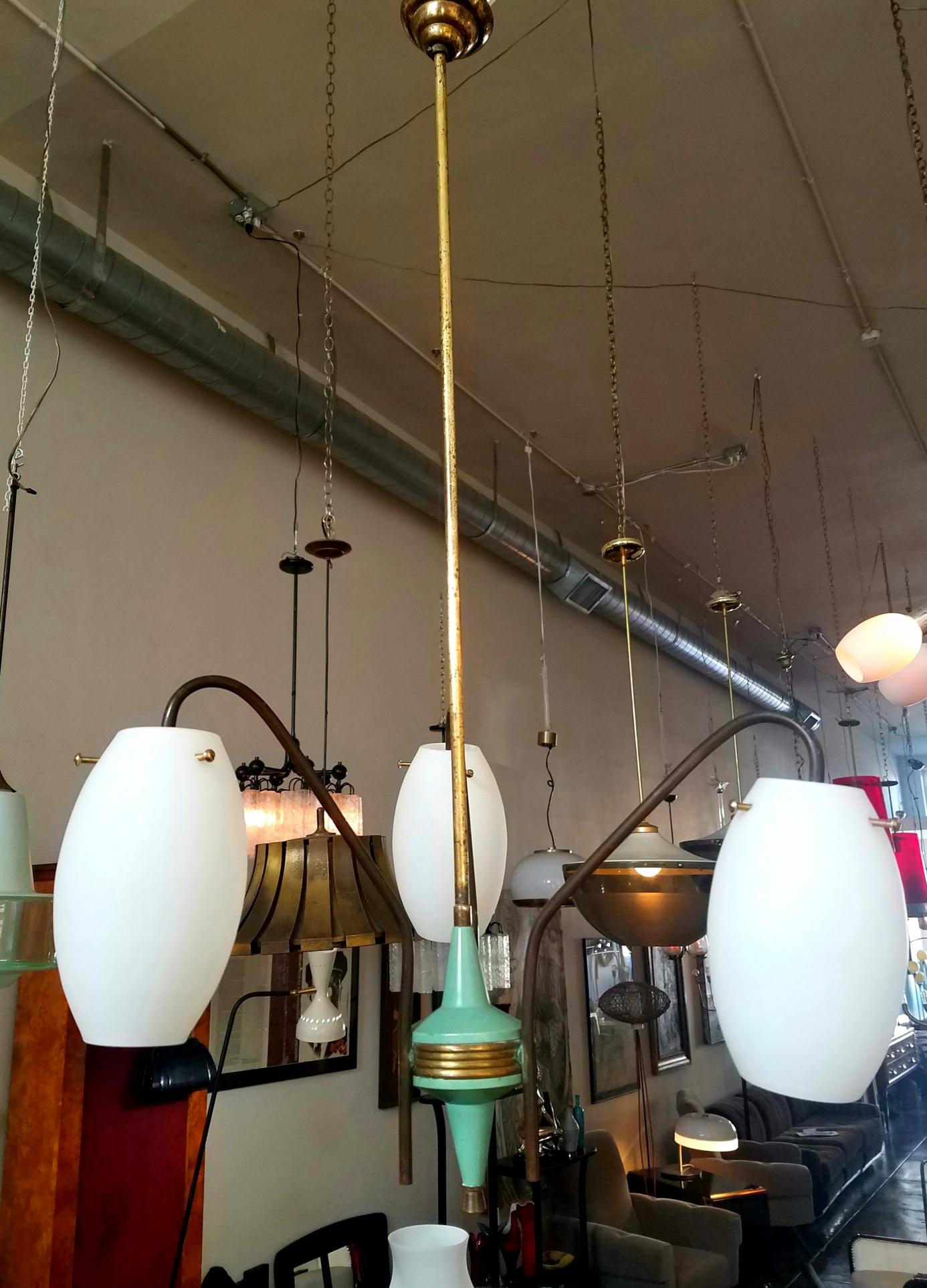 Italian 1950s brass chandelier and tree opaline glass shades.