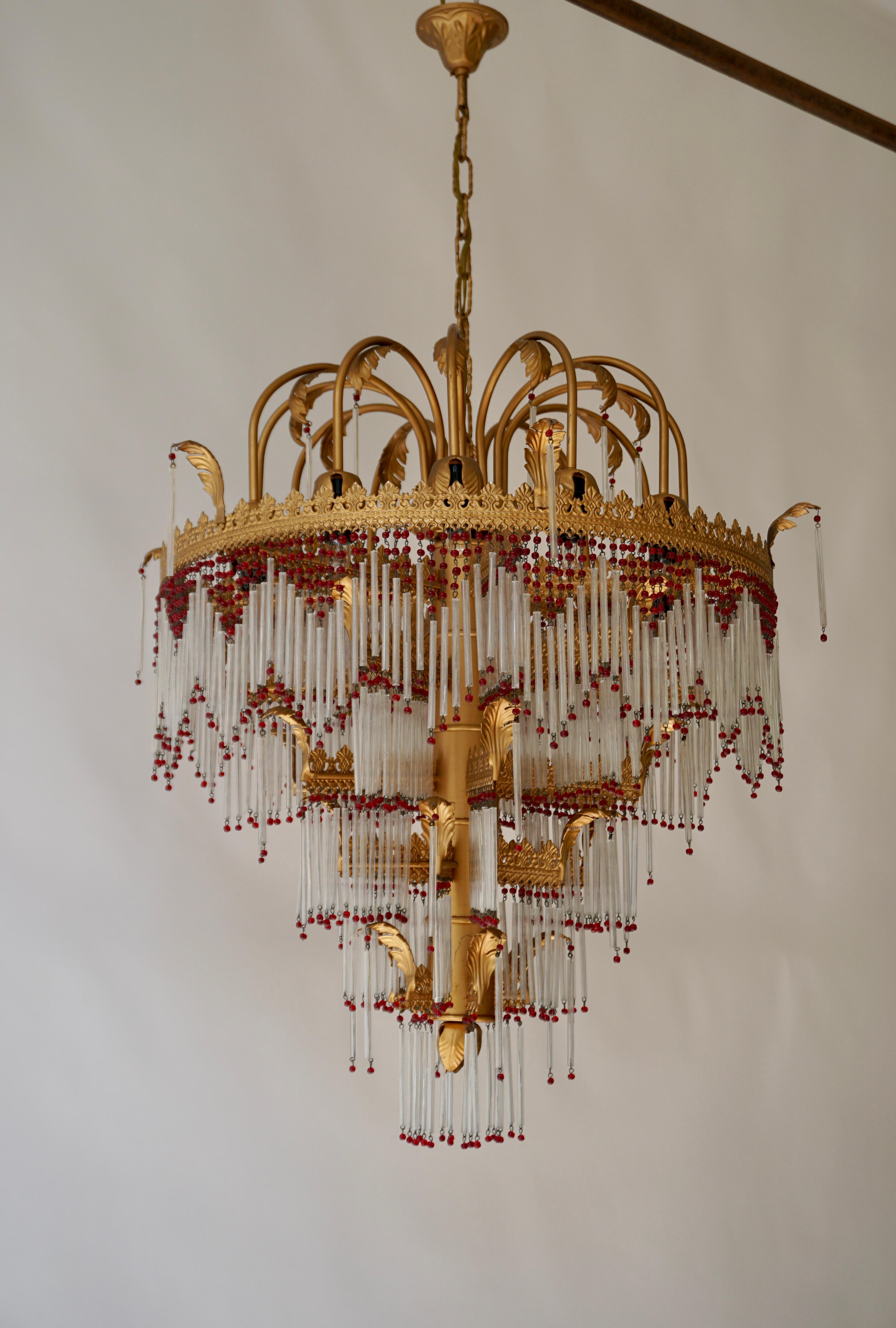 Large Italian Art nouveau style Murano glass and brass chandelier. 

The light requires 12 single E14 screw fit lightbulbs (60Watt max.) LED compatible. 

Measures: 
Diameter 64 cm. 
Height fixture 65 cm. 
Total height including the chain and