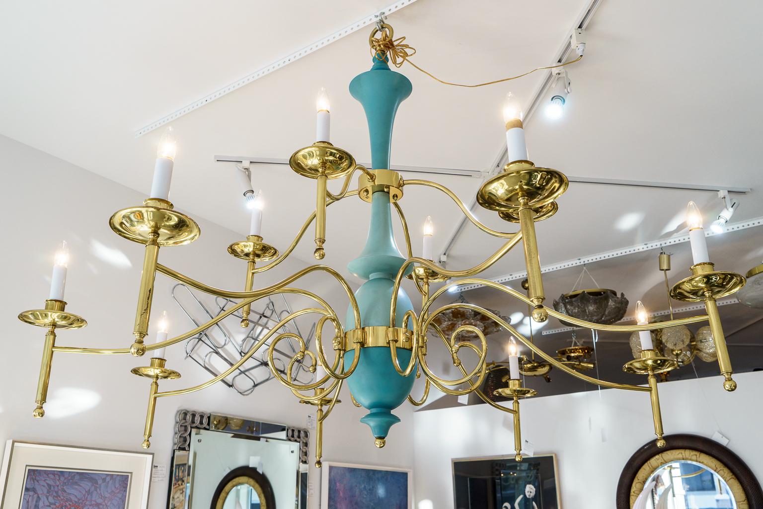 This stylish, chic and monumental scaled twelve-arm chandelier was acquired from a Palm Beach estate and it dates to the 1930s-1940s.

Note: Requires 12 Edison based bulbs.

Note: This piece has been professionally rewired as of May,