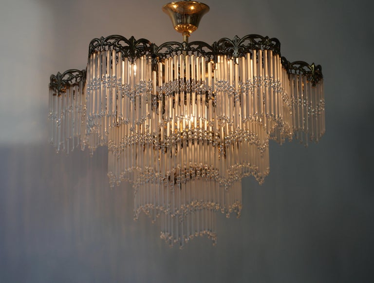 Murano glass and brass flush mount chandelier. 

The light requires 4 single E14 screw fit lightbulbs (60Watt max.) LED compatible. 

Measures: 
Diameter 53 cm. 
Height 46 cm.