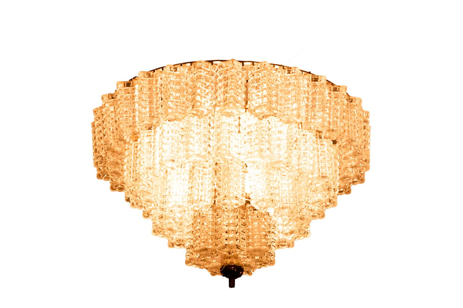 Italian chandelier in parallelepiped glass composed by four ranks that get smaller with glass rectangular tassels with diamond surface. Chandelier ended by a chromed metal sphere.

Italian work realized in the 1960s.

New and functional