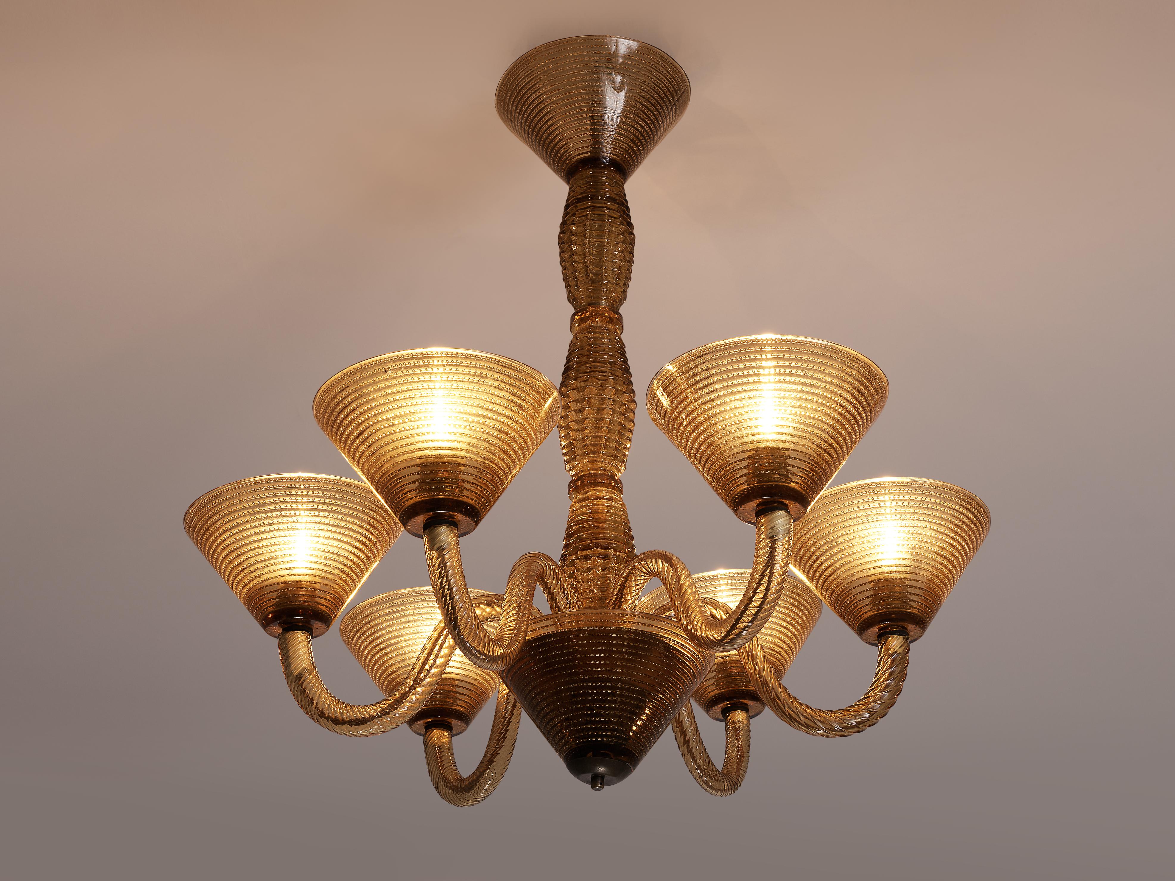 Chandelier with six arms, glass, metal, Italy, 1950s

This six-armed chandelier is made of soft brown colored glass. The glass features a structured surface with differently shaped lines. Six elegantly curved arms end in cone shaped shades that open