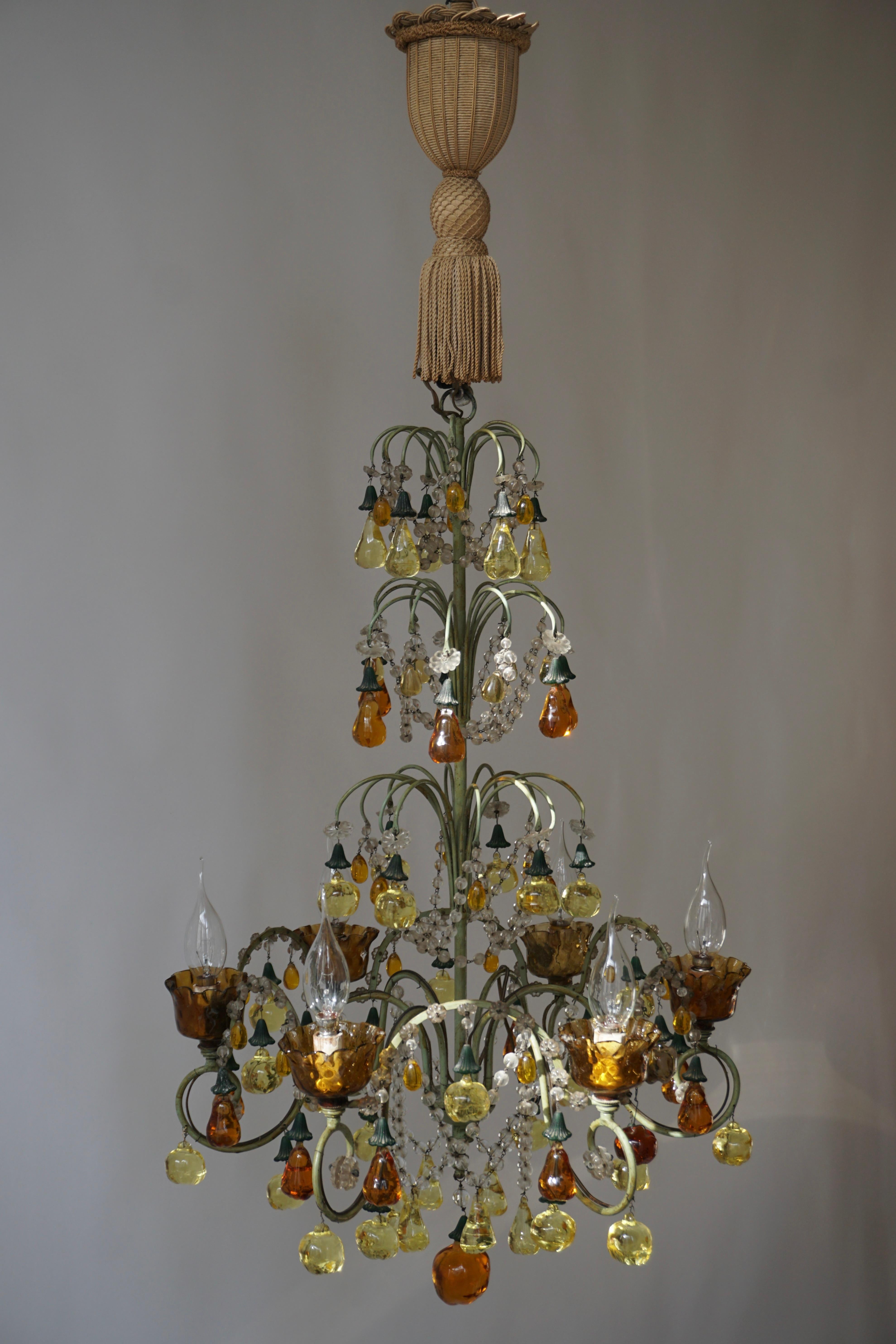 Fabulous, Italian 1950s green painted iron chandelier with Murano glass fruit decorations.
The chandelier consists of a gracefully scrolled green-iron frame with an assortment of glass fruits, pears and apples. 

The light requires six single E14