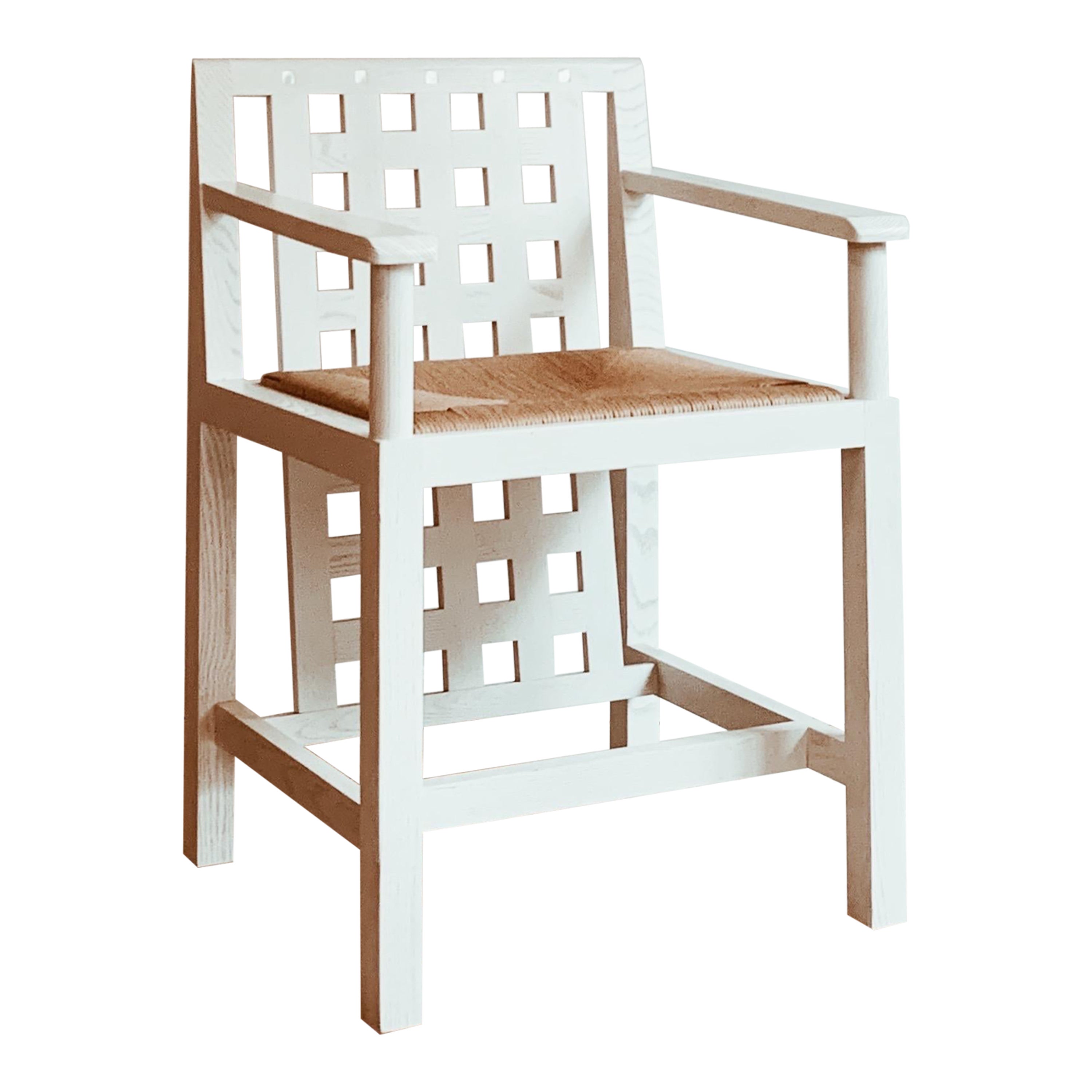 Four “Candida Cottage Chairs” in open pore white lacquered ash. Details in mother of Pearl.

Braided handmade cane seat. Edited in 1984 on a model designed by Mackintosh in 1912 but never directed by him.

The chairs are made of ash wood and paper