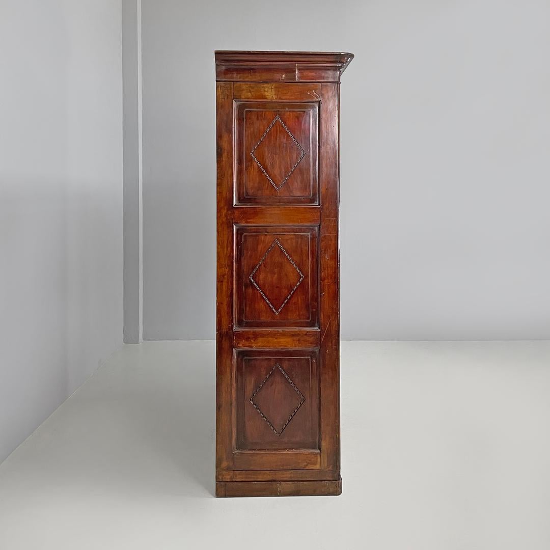 Italian Charles X style two-door wooden wardrobe with decorations, early 1800s In Fair Condition For Sale In MIlano, IT