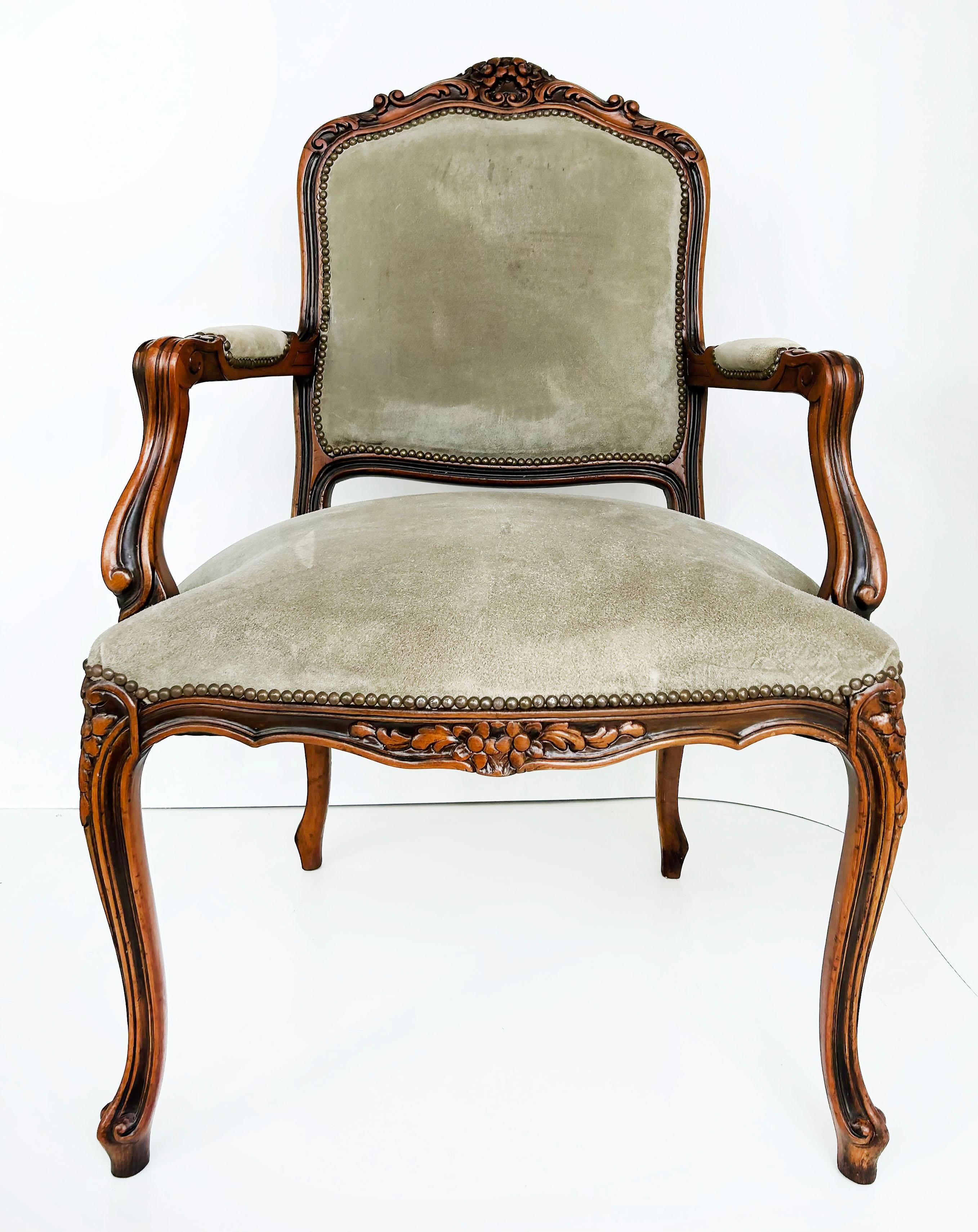 Italian Chateau d'Ax Carved Armchairs in Suede with Brass NailHeads, Pair

Offered for sale is a pair of Italian carved wood and suede armchairs with cabriole legs and brass nail heads. The chairs are In very good original condition with minor marks