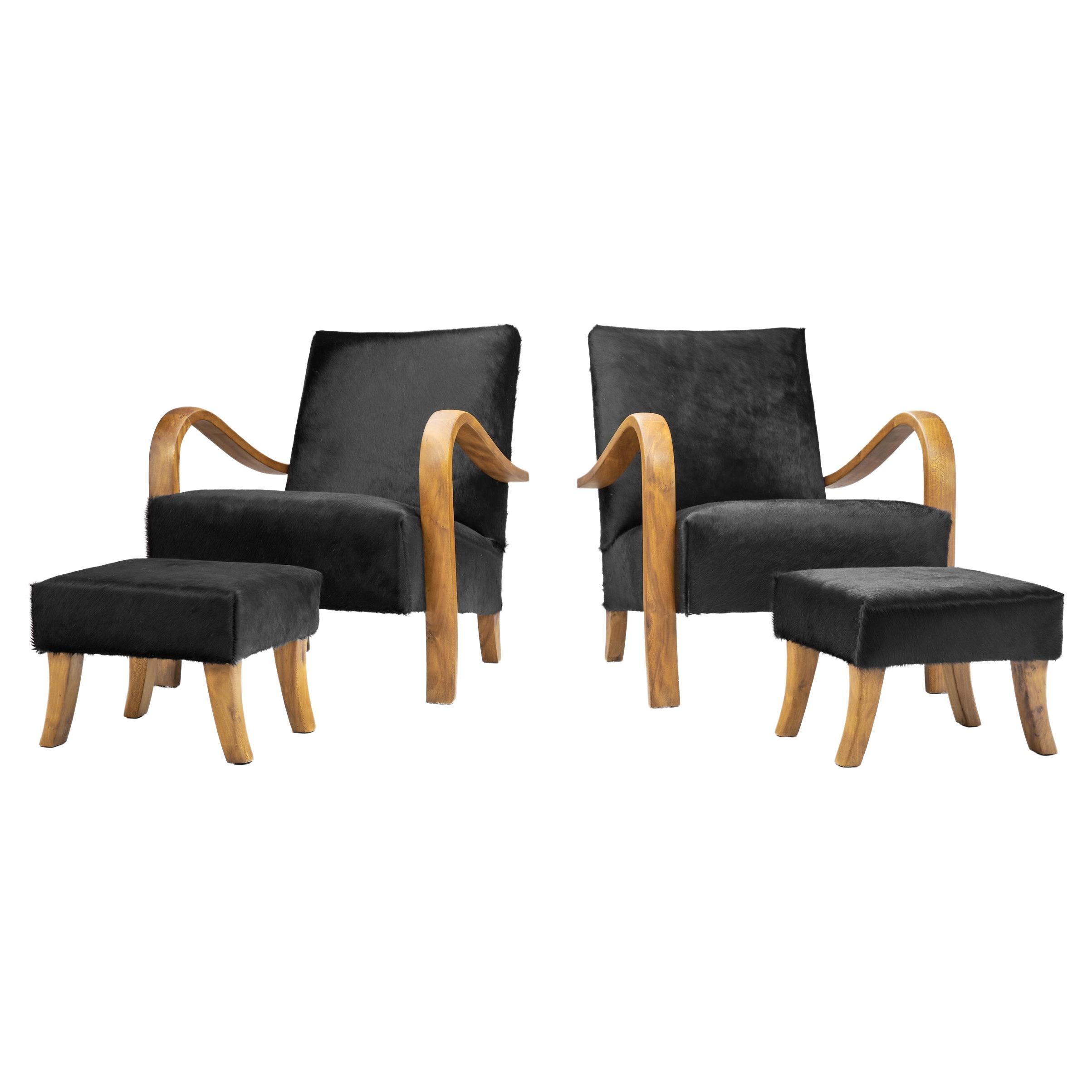 Italian Cherry Wood Lounge Chairs with Foot Stools in Dark Cowhide, Italy 1950s For Sale