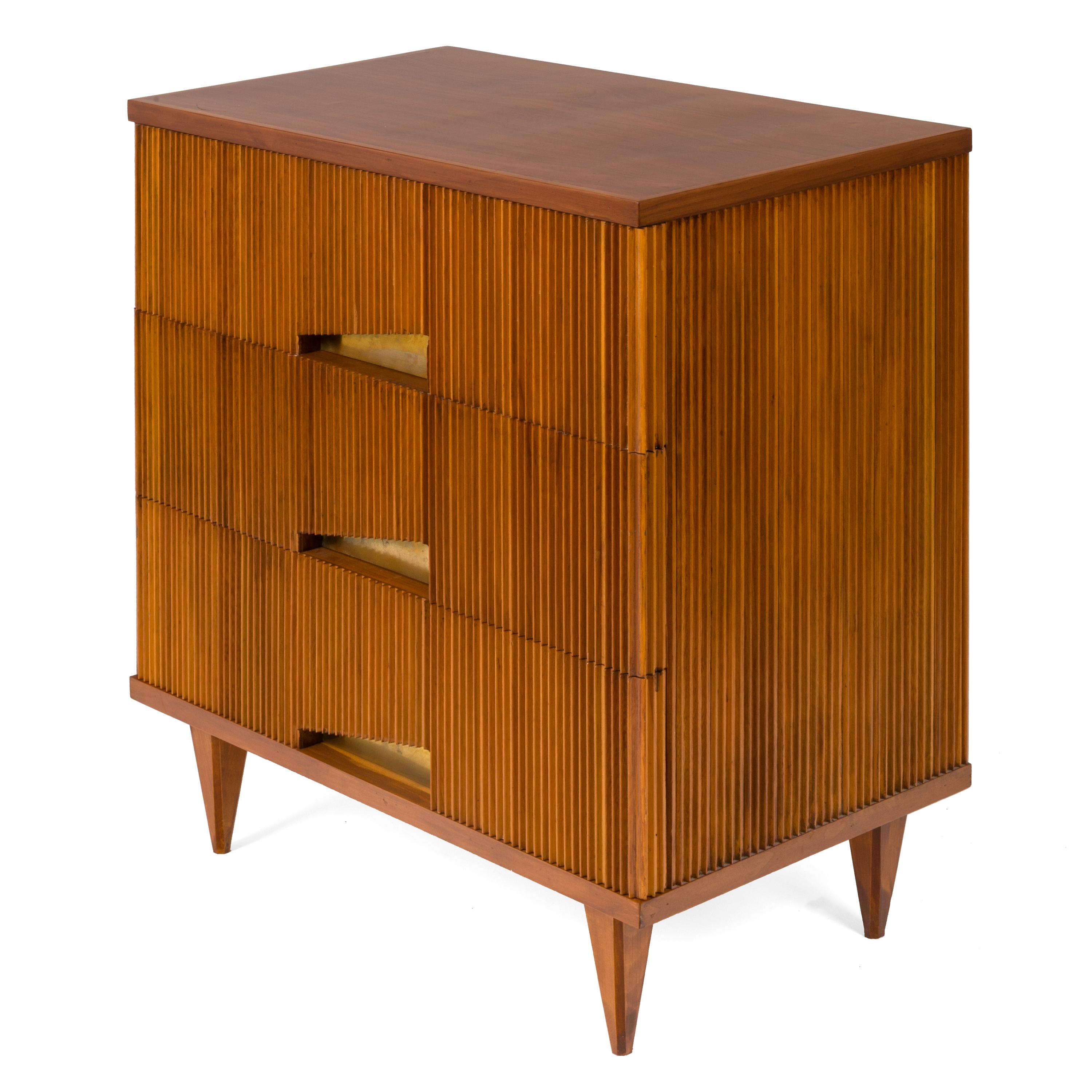 A very stylish chest with drawer pulls very reminiscent of the chest of drawers Gio Ponti designed in the 1950s.