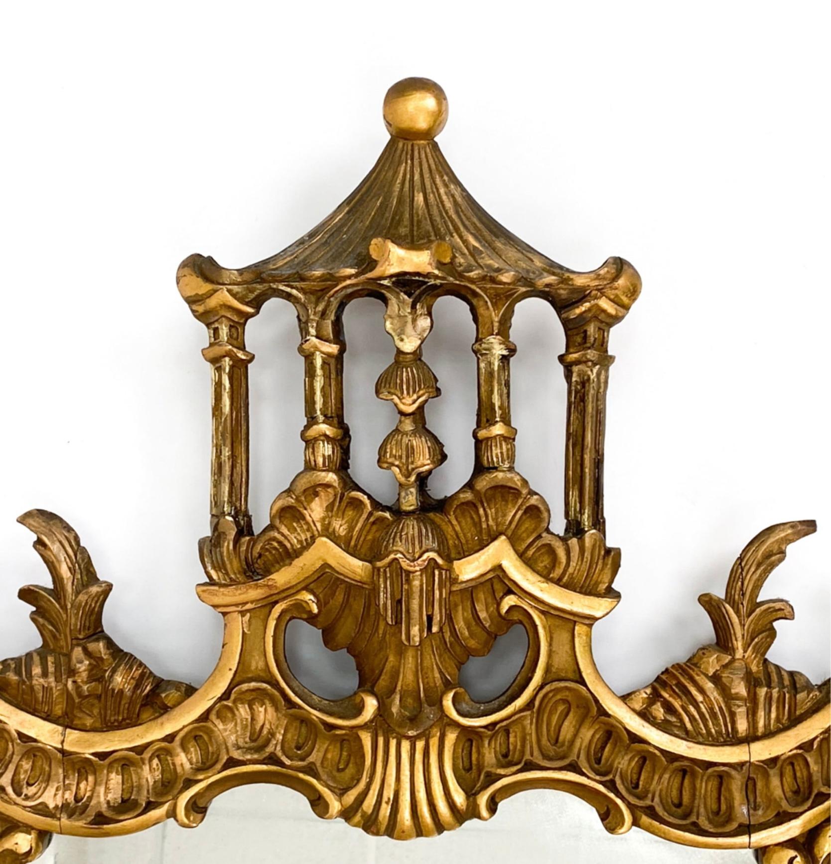 This is a 1960s Italian carved giltwood Chinese chippendale style mirror with carved pagoda pediment and two facing Ho Ho birds. It is marked illegibly. 

My shipping is running two to five weeks. No local pick up for this one or at least need some