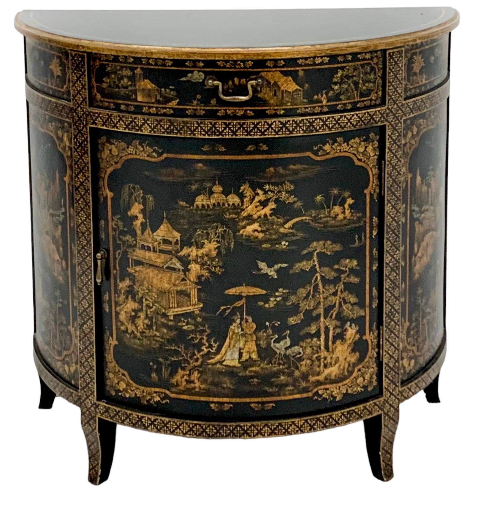 This is a late 20th century Italian regency style chinoiserie demilune form cabinet by Decorative Crafts. It opens to a single shelf. The chinoiserie is particularly detailed with pastoral scenes. It is marked.